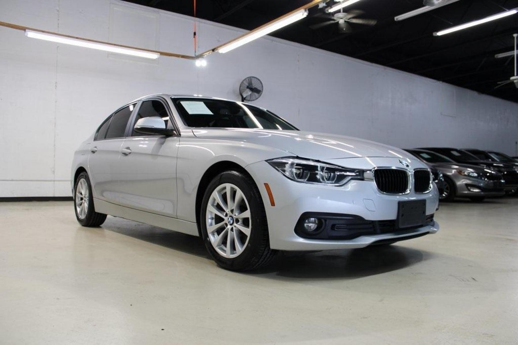 2018 Glacier Silver Metallic /Black BMW 3 Series 320i (WBA8E1G52JN) with an 2.0L 4-Cylinder DOHC 16V TwinPower Turbo engine, Automatic transmission, located at 15300 Midway Rd., Addison, TX, 75001, (972) 702-0011, 32.958321, -96.838074 - Photo #1