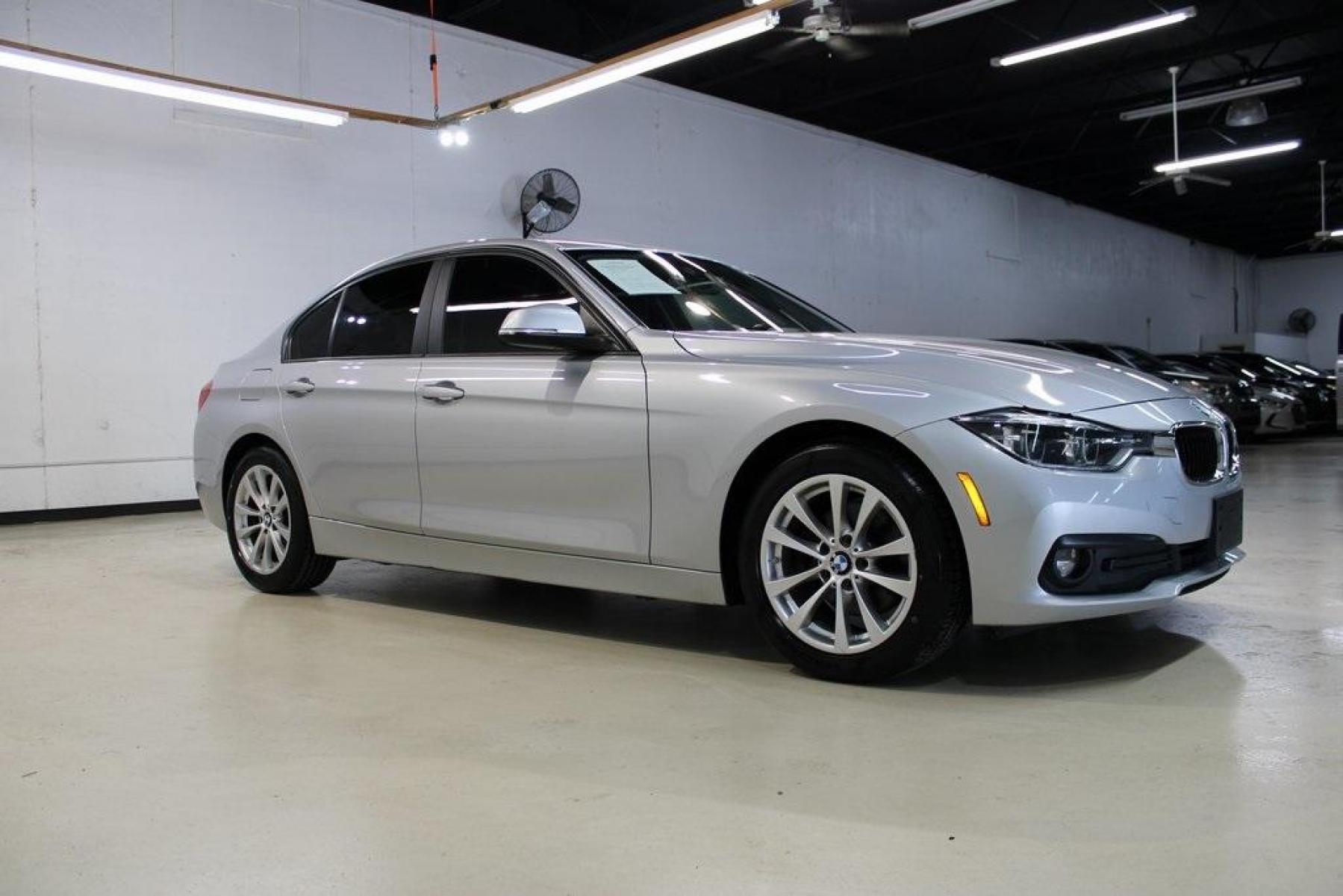2018 Glacier Silver Metallic /Black BMW 3 Series 320i (WBA8E1G52JN) with an 2.0L 4-Cylinder DOHC 16V TwinPower Turbo engine, Automatic transmission, located at 15300 Midway Rd., Addison, TX, 75001, (972) 702-0011, 32.958321, -96.838074 - HOME OF THE NO HAGGLE PRICE - WHOLESALE PRICES TO THE PUBLIC!! 320i, 4D Sedan, 2.0L 4-Cylinder DOHC 16V TwinPower Turbo, 8-Speed Automatic, RWD, Glacier Silver Metallic, Black Artificial Leather.<br><br>Glacier Silver Metallic 2018 BMW 3 Series 320i<br><br>Recent Arrival! 24/35 City/Highway MPG<br>< - Photo #7