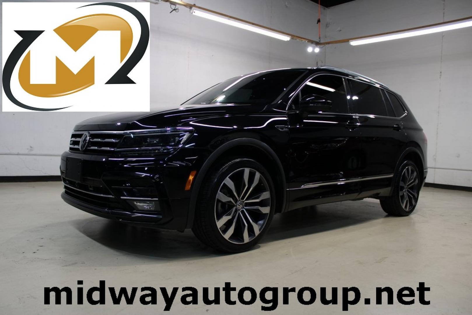 2021 Deep Black Pearl /Saffrano Orange and Black Volkswagen Tiguan 2.0T SEL Premium R-Line (3VV4B7AX4MM) with an 2.0L TSI DOHC engine, Automatic transmission, located at 15300 Midway Rd., Addison, TX, 75001, (972) 702-0011, 32.958321, -96.838074 - Photo#0