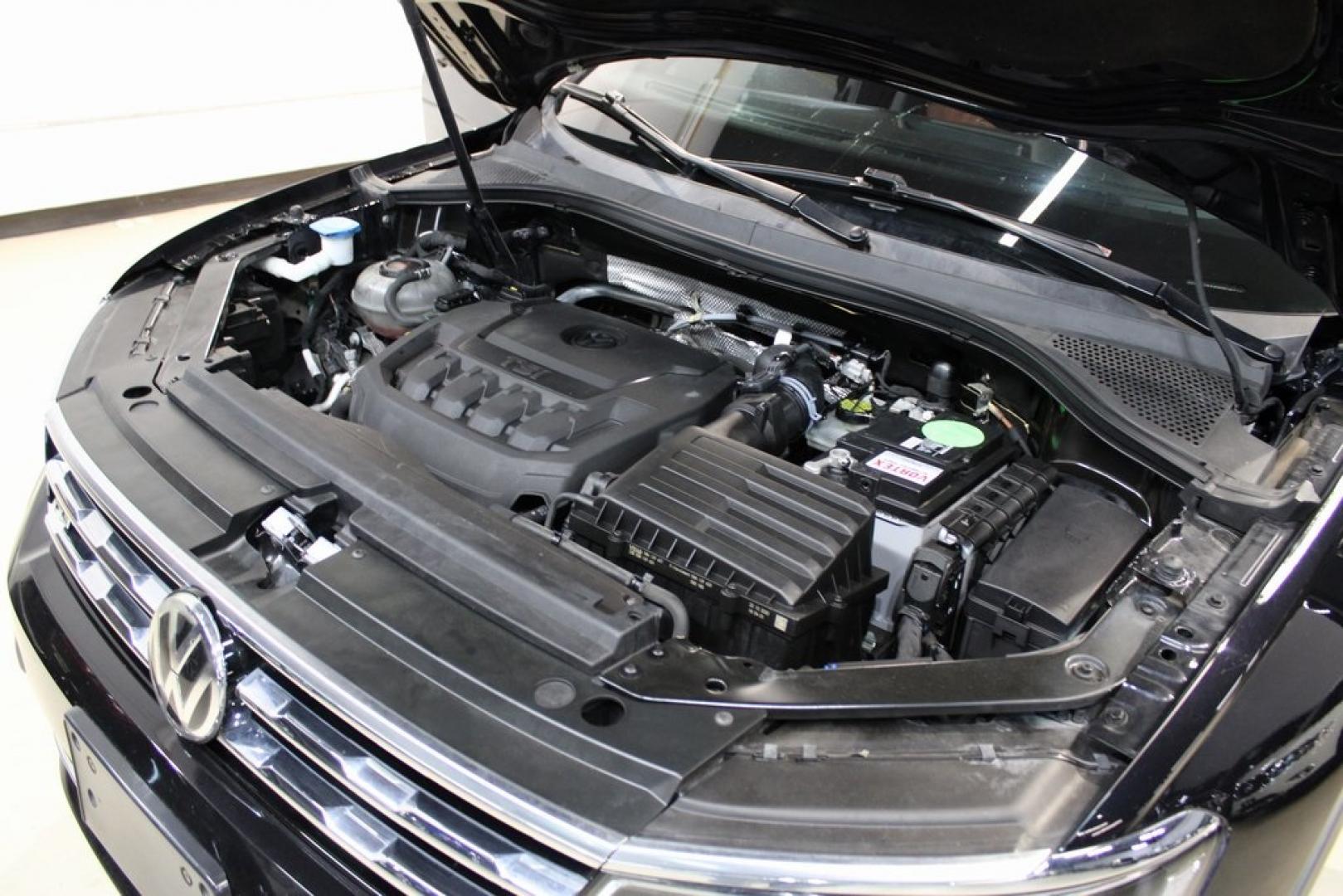 2021 Deep Black Pearl /Saffrano Orange and Black Volkswagen Tiguan 2.0T SEL Premium R-Line (3VV4B7AX4MM) with an 2.0L TSI DOHC engine, Automatic transmission, located at 15300 Midway Rd., Addison, TX, 75001, (972) 702-0011, 32.958321, -96.838074 - Photo#30