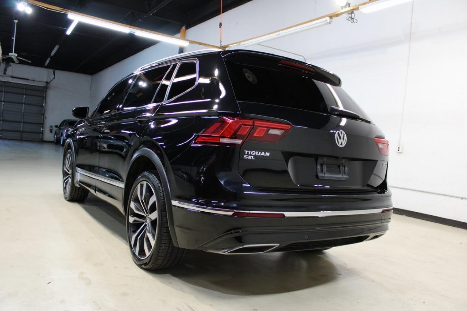 2021 Deep Black Pearl /Saffrano Orange and Black Volkswagen Tiguan 2.0T SEL Premium R-Line (3VV4B7AX4MM) with an 2.0L TSI DOHC engine, Automatic transmission, located at 15300 Midway Rd., Addison, TX, 75001, (972) 702-0011, 32.958321, -96.838074 - Photo#3