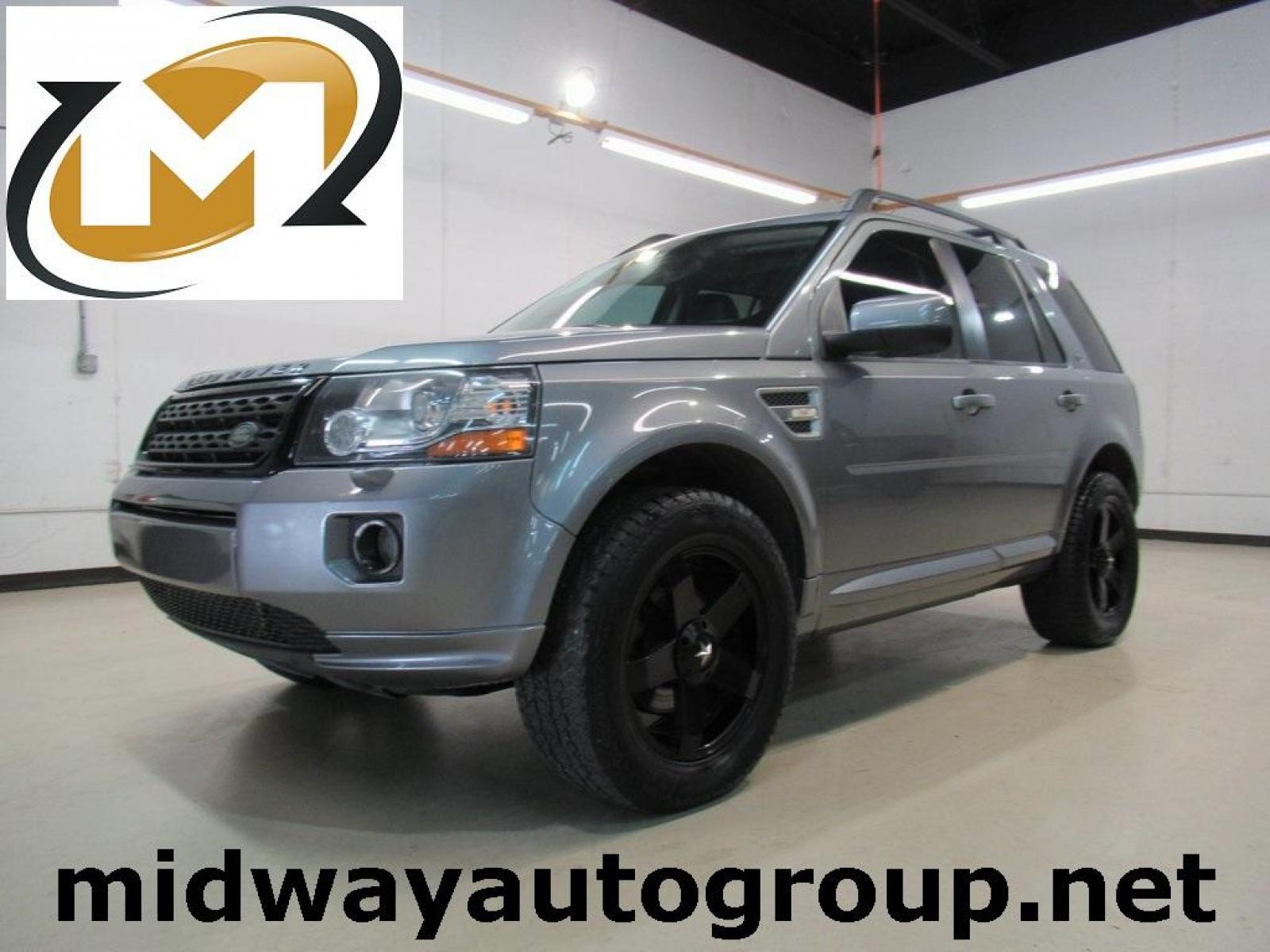 2013 Indus Silver /Ebony Land Rover LR2 Base (SALFR2BG5DH) with an 2.0L 4-Cylinder Turbocharged engine, Automatic transmission, located at 15300 Midway Rd., Addison, 75001, (972) 702-0011, 32.958321, -96.838074 - HOME OF THE NO HAGGLE PRICE - WHOLESALE PRICES TO THE PUBLIC!! 4D Sport Utility, 2.0L 4-Cylinder Turbocharged, 6-Speed Automatic with Command Shift, 4WD, Silver, Ebony Leather.<br><br>Silver 2013 Land Rover LR2<br><br><br>At Midway Auto Group, we strive to provide you with the best quality vehicles - Photo #0