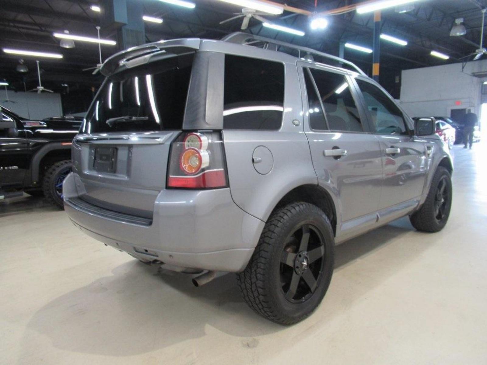 2013 Indus Silver /Ebony Land Rover LR2 Base (SALFR2BG5DH) with an 2.0L 4-Cylinder Turbocharged engine, Automatic transmission, located at 15300 Midway Rd., Addison, 75001, (972) 702-0011, 32.958321, -96.838074 - HOME OF THE NO HAGGLE PRICE - WHOLESALE PRICES TO THE PUBLIC!! 4D Sport Utility, 2.0L 4-Cylinder Turbocharged, 6-Speed Automatic with Command Shift, 4WD, Silver, Ebony Leather.<br><br>Silver 2013 Land Rover LR2<br><br><br>At Midway Auto Group, we strive to provide you with the best quality vehicles - Photo #2