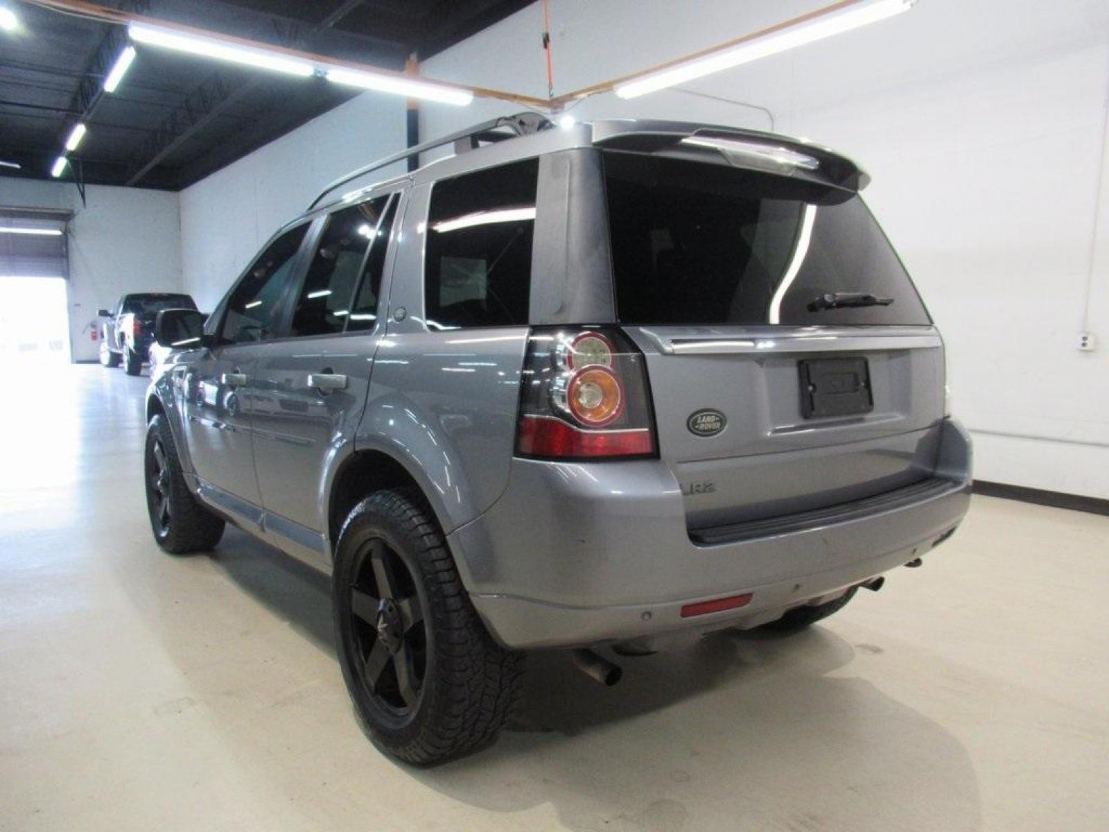 2013 Indus Silver /Ebony Land Rover LR2 Base (SALFR2BG5DH) with an 2.0L 4-Cylinder Turbocharged engine, Automatic transmission, located at 15300 Midway Rd., Addison, 75001, (972) 702-0011, 32.958321, -96.838074 - HOME OF THE NO HAGGLE PRICE - WHOLESALE PRICES TO THE PUBLIC!! 4D Sport Utility, 2.0L 4-Cylinder Turbocharged, 6-Speed Automatic with Command Shift, 4WD, Silver, Ebony Leather.<br><br>Silver 2013 Land Rover LR2<br><br><br>At Midway Auto Group, we strive to provide you with the best quality vehicles - Photo #3