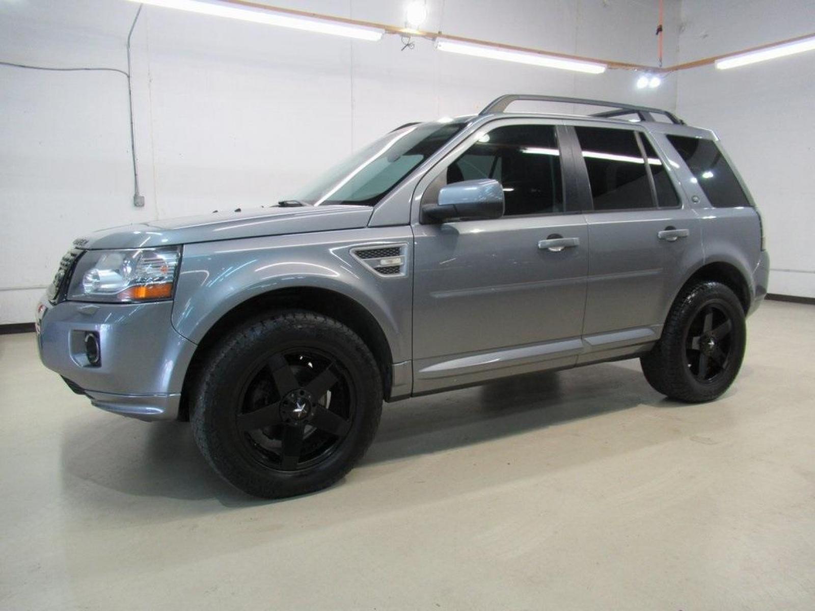 2013 Indus Silver /Ebony Land Rover LR2 Base (SALFR2BG5DH) with an 2.0L 4-Cylinder Turbocharged engine, Automatic transmission, located at 15300 Midway Rd., Addison, 75001, (972) 702-0011, 32.958321, -96.838074 - Photo #4