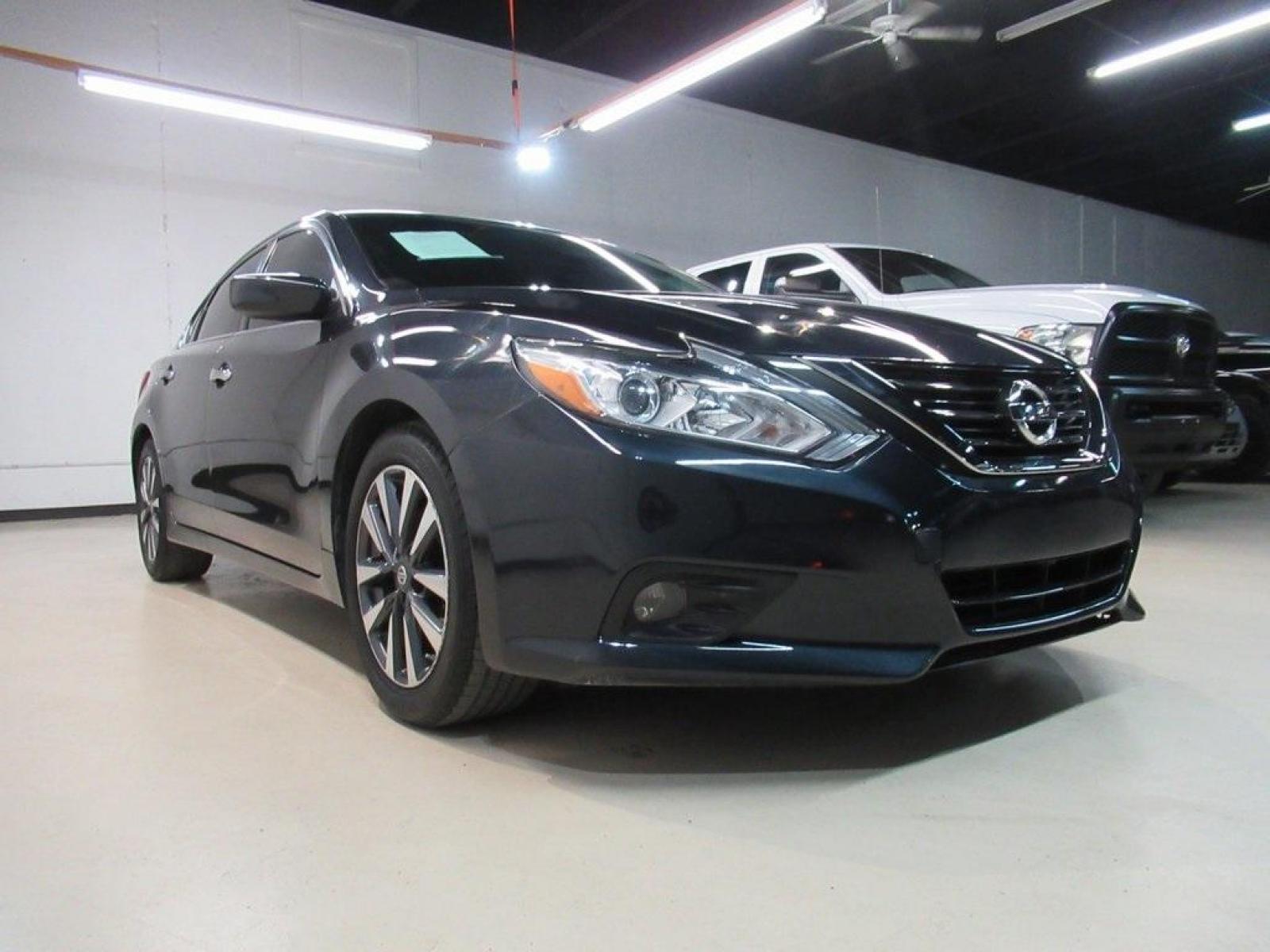 2017 Storm Blue /Charcoal Nissan Altima 2.5 SV (1N4AL3AP0HC) with an 2.5L 4-Cylinder DOHC 16V engine, CVT transmission, located at 15300 Midway Rd., Addison, 75001, (972) 702-0011, 32.958321, -96.838074 - HOME OF THE NO HAGGLE PRICE - WHOLESALE PRICES TO THE PUBLIC!! Altima 2.5 SV, 4D Sedan, 2.5L 4-Cylinder DOHC 16V, CVT, FWD, Blue, Charcoal Cloth.<br><br>Blue 2017 Nissan Altima 2.5 SV<br><br>27/39 City/Highway MPG<br><br><br>At Midway Auto Group, we strive to provide you with the best quality vehicl - Photo #1