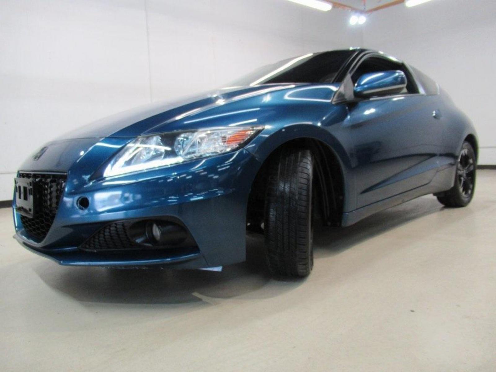 2014 North Shore Blue Pearl /Black Honda CR-Z EX (JHMZF1D6XES) with an 1.5L 16V 4-Cylinder SOHC i-VTEC engine, CVT transmission, located at 15300 Midway Rd., Addison, 75001, (972) 702-0011, 32.958321, -96.838074 - HOME OF THE NO HAGGLE PRICE - WHOLESALE PRICES TO THE PUBLIC!! CR-Z EX, 2D Hatchback, 1.5L 16V 4-Cylinder SOHC i-VTEC, CVT, FWD, Black w/Mesh Seat Trim.<br><br>North Shore Blue Pearl 2014 Honda CR-Z EX<br><br>36/39 City/Highway MPG<br><br>Awards:<br> * 2014 KBB.com Brand Image Awards<br>Kelley Blue - Photo #16