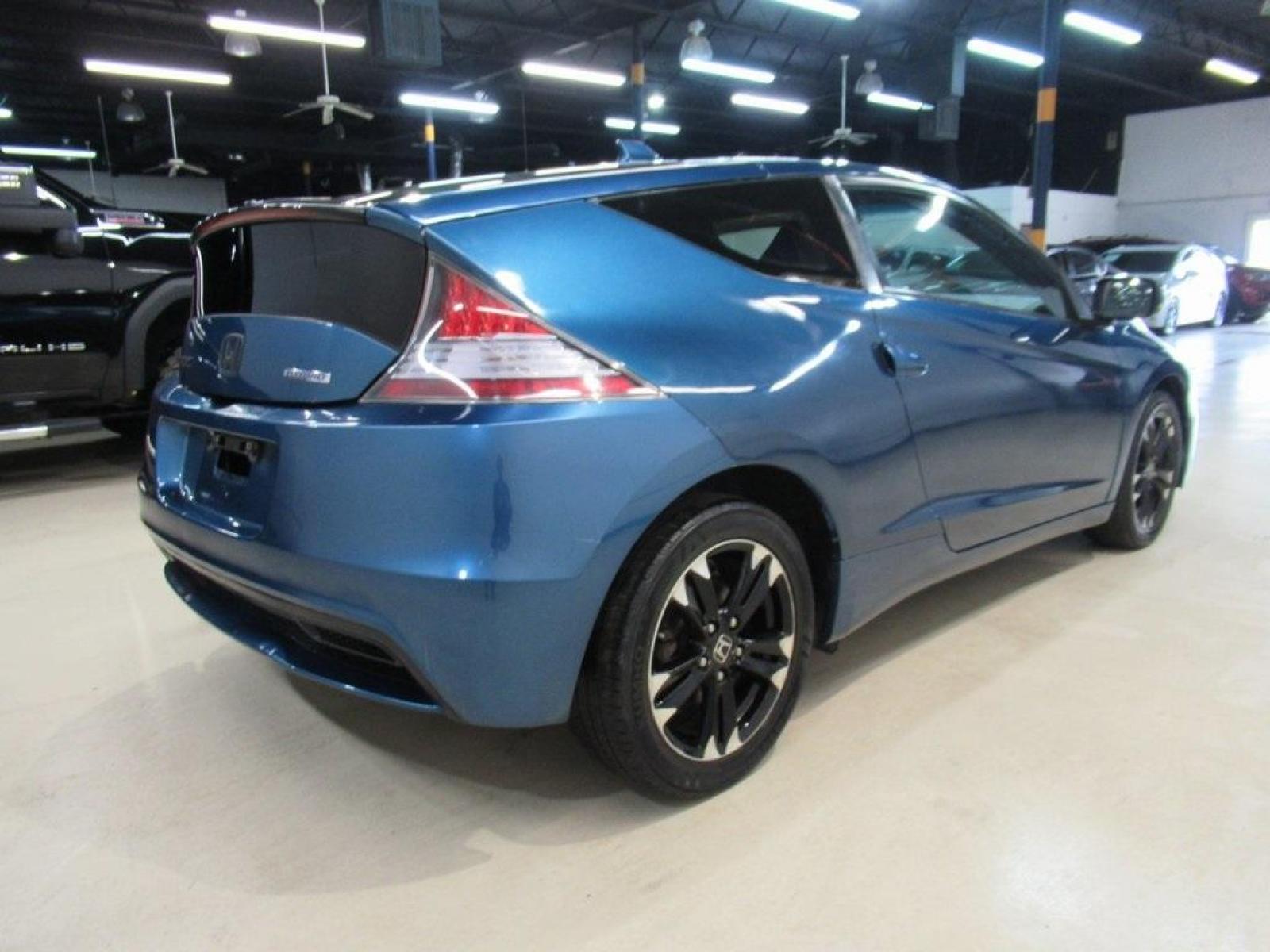 2014 North Shore Blue Pearl /Black Honda CR-Z EX (JHMZF1D6XES) with an 1.5L 16V 4-Cylinder SOHC i-VTEC engine, CVT transmission, located at 15300 Midway Rd., Addison, 75001, (972) 702-0011, 32.958321, -96.838074 - HOME OF THE NO HAGGLE PRICE - WHOLESALE PRICES TO THE PUBLIC!! CR-Z EX, 2D Hatchback, 1.5L 16V 4-Cylinder SOHC i-VTEC, CVT, FWD, Black w/Mesh Seat Trim.<br><br>North Shore Blue Pearl 2014 Honda CR-Z EX<br><br>36/39 City/Highway MPG<br><br>Awards:<br> * 2014 KBB.com Brand Image Awards<br>Kelley Blue - Photo #2