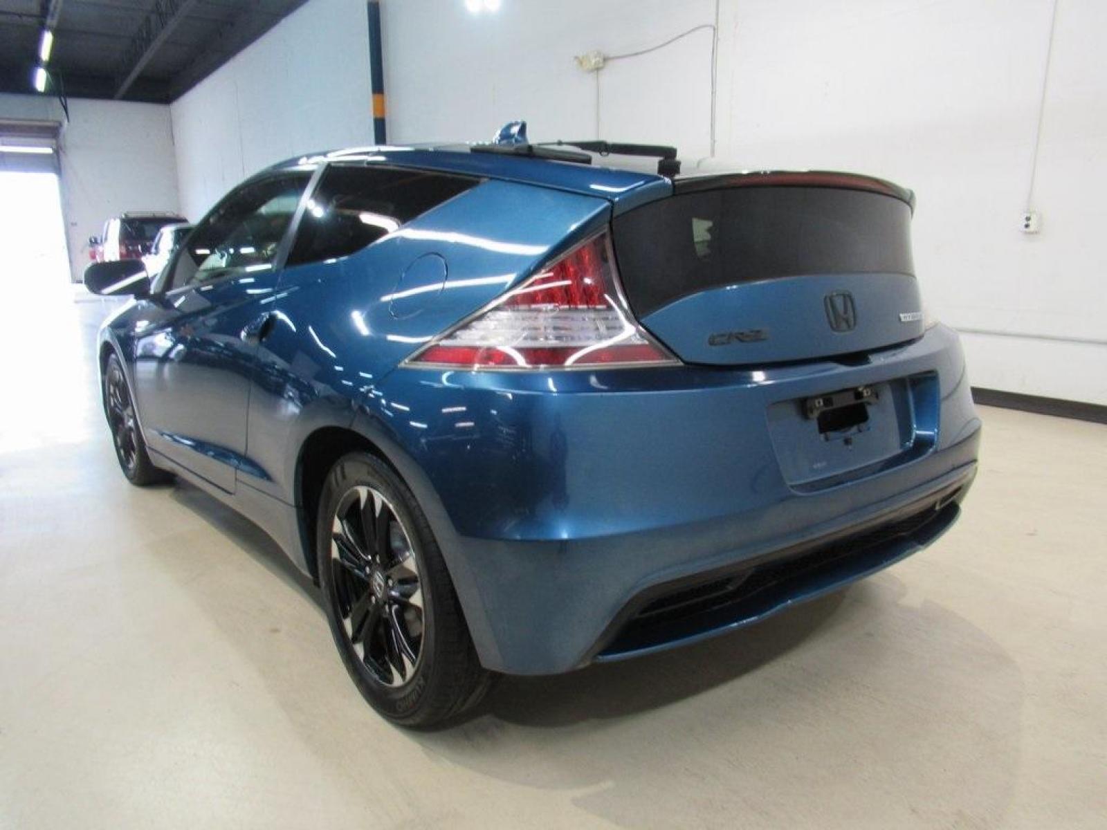 2014 North Shore Blue Pearl /Black Honda CR-Z EX (JHMZF1D6XES) with an 1.5L 16V 4-Cylinder SOHC i-VTEC engine, CVT transmission, located at 15300 Midway Rd., Addison, 75001, (972) 702-0011, 32.958321, -96.838074 - HOME OF THE NO HAGGLE PRICE - WHOLESALE PRICES TO THE PUBLIC!! CR-Z EX, 2D Hatchback, 1.5L 16V 4-Cylinder SOHC i-VTEC, CVT, FWD, Black w/Mesh Seat Trim.<br><br>North Shore Blue Pearl 2014 Honda CR-Z EX<br><br>36/39 City/Highway MPG<br><br>Awards:<br> * 2014 KBB.com Brand Image Awards<br>Kelley Blue - Photo #3