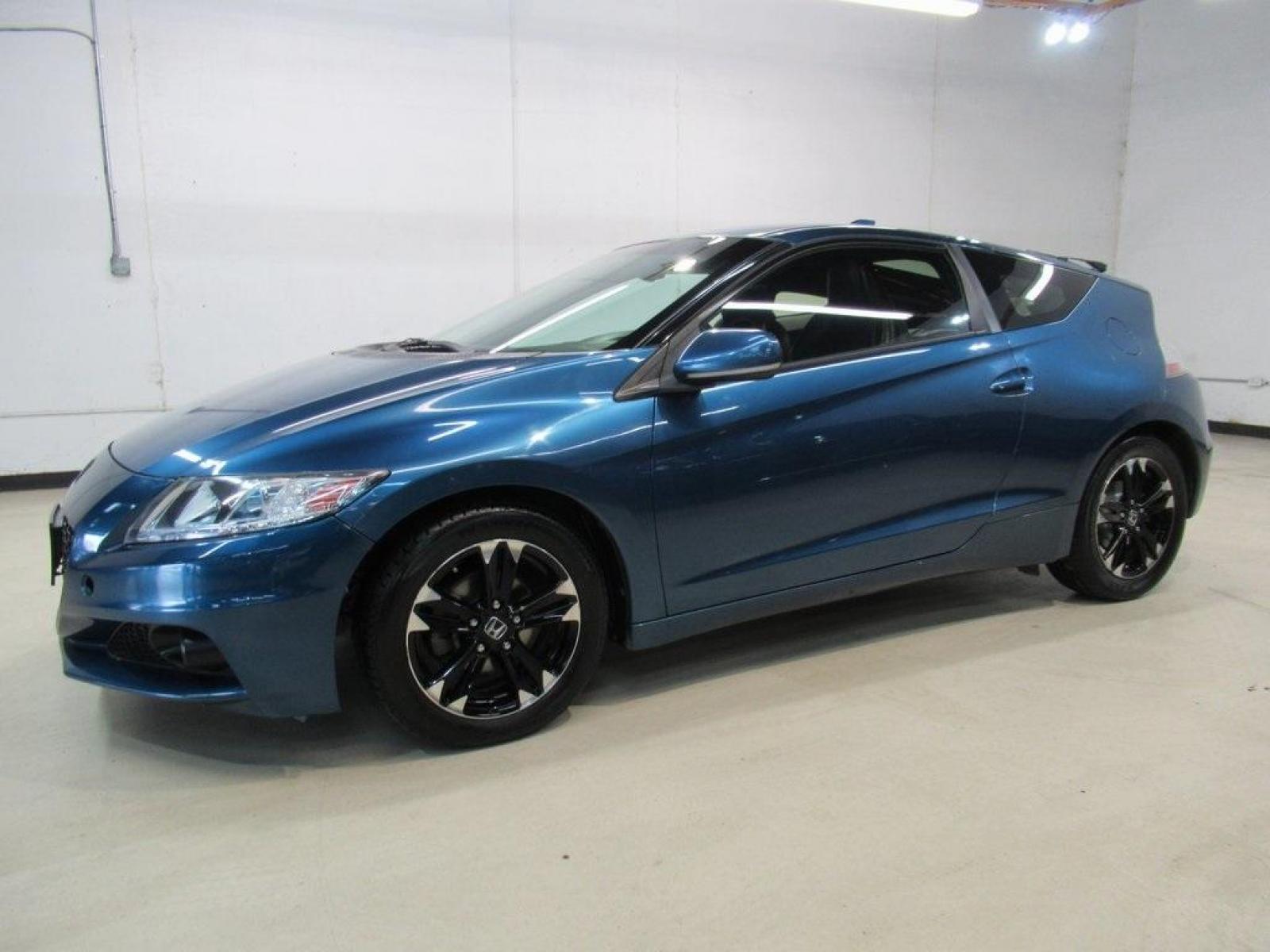 2014 North Shore Blue Pearl /Black Honda CR-Z EX (JHMZF1D6XES) with an 1.5L 16V 4-Cylinder SOHC i-VTEC engine, CVT transmission, located at 15300 Midway Rd., Addison, 75001, (972) 702-0011, 32.958321, -96.838074 - HOME OF THE NO HAGGLE PRICE - WHOLESALE PRICES TO THE PUBLIC!! CR-Z EX, 2D Hatchback, 1.5L 16V 4-Cylinder SOHC i-VTEC, CVT, FWD, Black w/Mesh Seat Trim.<br><br>North Shore Blue Pearl 2014 Honda CR-Z EX<br><br>36/39 City/Highway MPG<br><br>Awards:<br> * 2014 KBB.com Brand Image Awards<br>Kelley Blue - Photo #4