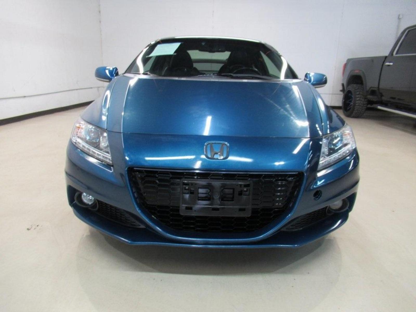 2014 North Shore Blue Pearl /Black Honda CR-Z EX (JHMZF1D6XES) with an 1.5L 16V 4-Cylinder SOHC i-VTEC engine, CVT transmission, located at 15300 Midway Rd., Addison, 75001, (972) 702-0011, 32.958321, -96.838074 - HOME OF THE NO HAGGLE PRICE - WHOLESALE PRICES TO THE PUBLIC!! CR-Z EX, 2D Hatchback, 1.5L 16V 4-Cylinder SOHC i-VTEC, CVT, FWD, Black w/Mesh Seat Trim.<br><br>North Shore Blue Pearl 2014 Honda CR-Z EX<br><br>36/39 City/Highway MPG<br><br>Awards:<br> * 2014 KBB.com Brand Image Awards<br>Kelley Blue - Photo #5