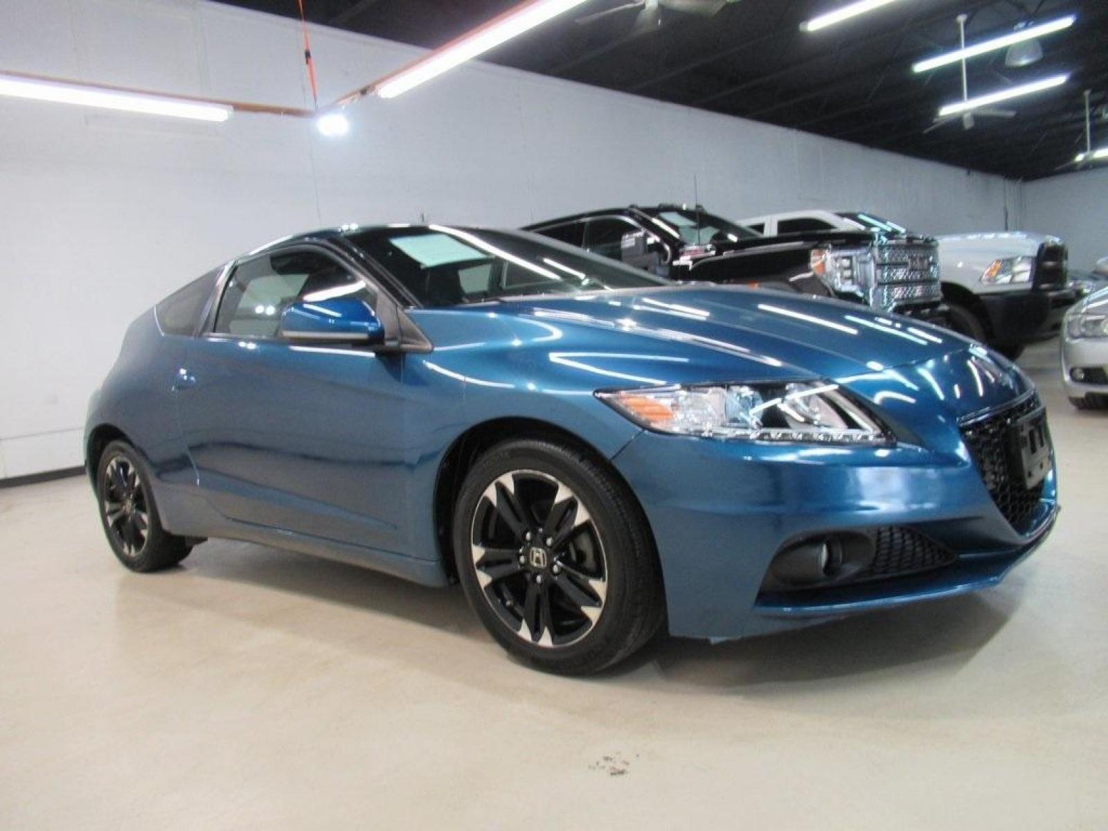2014 North Shore Blue Pearl /Black Honda CR-Z EX (JHMZF1D6XES) with an 1.5L 16V 4-Cylinder SOHC i-VTEC engine, CVT transmission, located at 15300 Midway Rd., Addison, 75001, (972) 702-0011, 32.958321, -96.838074 - HOME OF THE NO HAGGLE PRICE - WHOLESALE PRICES TO THE PUBLIC!! CR-Z EX, 2D Hatchback, 1.5L 16V 4-Cylinder SOHC i-VTEC, CVT, FWD, Black w/Mesh Seat Trim.<br><br>North Shore Blue Pearl 2014 Honda CR-Z EX<br><br>36/39 City/Highway MPG<br><br>Awards:<br> * 2014 KBB.com Brand Image Awards<br>Kelley Blue - Photo #6