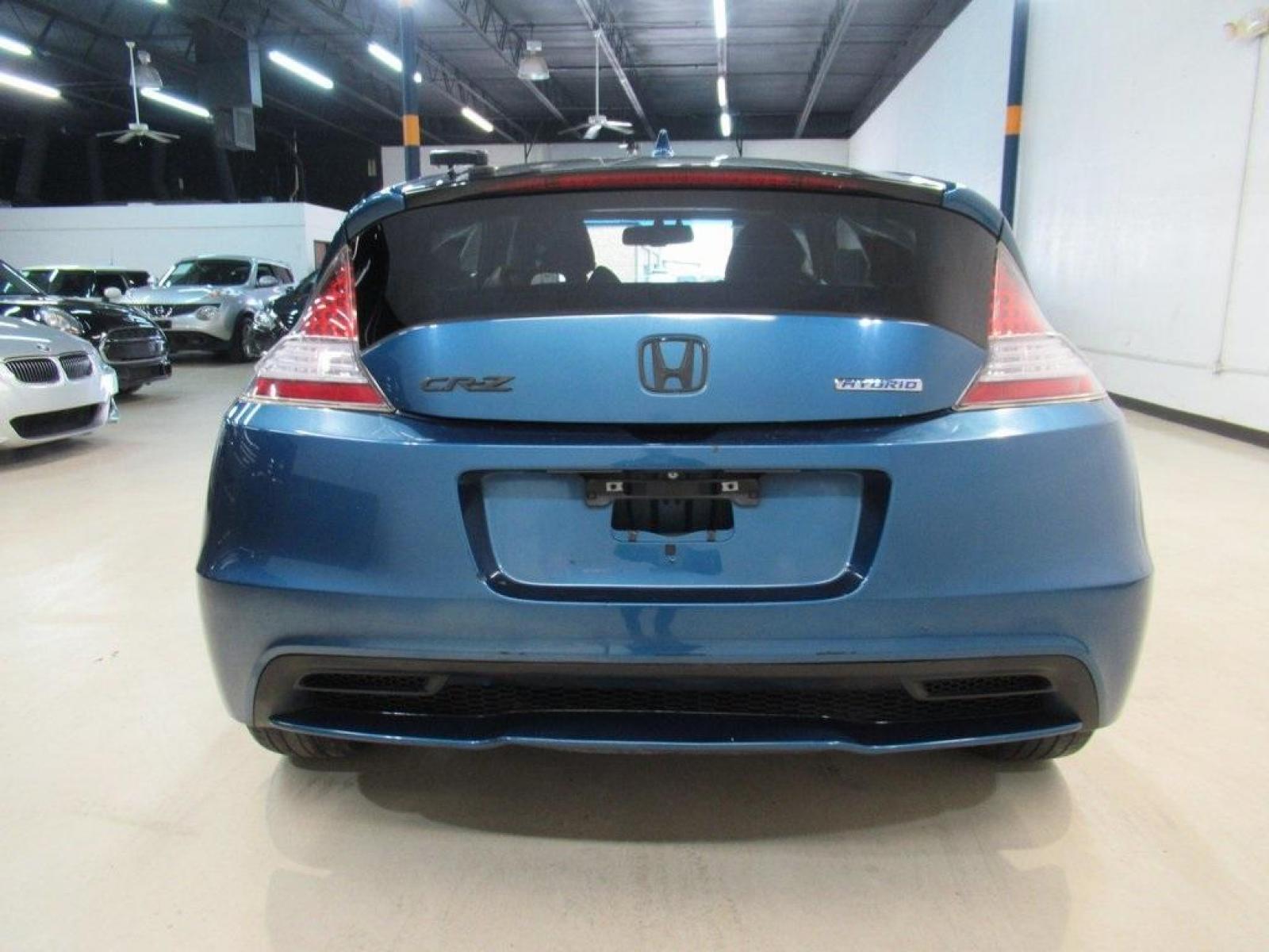 2014 North Shore Blue Pearl /Black Honda CR-Z EX (JHMZF1D6XES) with an 1.5L 16V 4-Cylinder SOHC i-VTEC engine, CVT transmission, located at 15300 Midway Rd., Addison, 75001, (972) 702-0011, 32.958321, -96.838074 - HOME OF THE NO HAGGLE PRICE - WHOLESALE PRICES TO THE PUBLIC!! CR-Z EX, 2D Hatchback, 1.5L 16V 4-Cylinder SOHC i-VTEC, CVT, FWD, Black w/Mesh Seat Trim.<br><br>North Shore Blue Pearl 2014 Honda CR-Z EX<br><br>36/39 City/Highway MPG<br><br>Awards:<br> * 2014 KBB.com Brand Image Awards<br>Kelley Blue - Photo #7