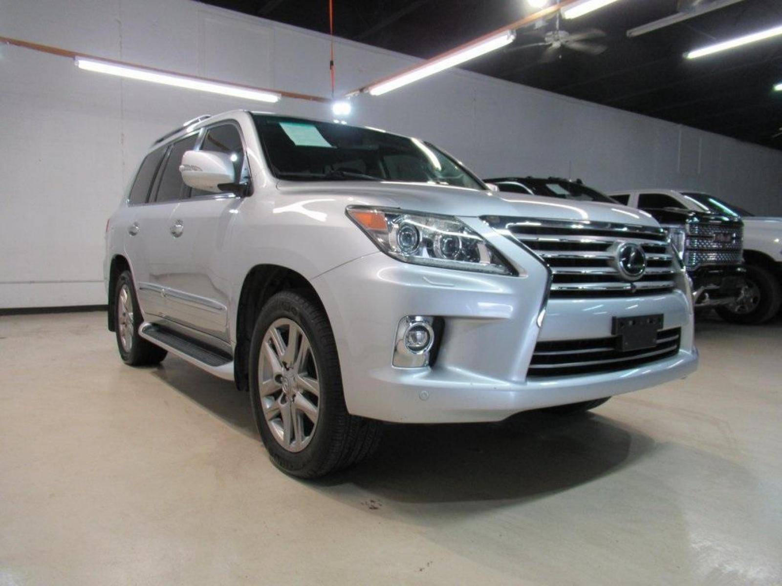 2014 Starfire Pearl /Black Lexus LX 570 (JTJHY7AXXE4) with an 5.7L V8 DOHC Dual VVT-i 32V engine, Automatic transmission, located at 15300 Midway Rd., Addison, 75001, (972) 702-0011, 32.958321, -96.838074 - HOME OF THE NO HAGGLE PRICE - WHOLESALE PRICES TO THE PUBLIC!! LX 570, 4D Sport Utility, 5.7L V8 DOHC Dual VVT-i 32V, 6-Speed Automatic with Sequential Shift ECT, 4WD, Black Leather.<br><br>2014 Lexus LX 570<br><br>Recent Arrival!<br><br>Awards:<br> * 2014 KBB.com Best Resale Value Awards * 2014 - Photo #1