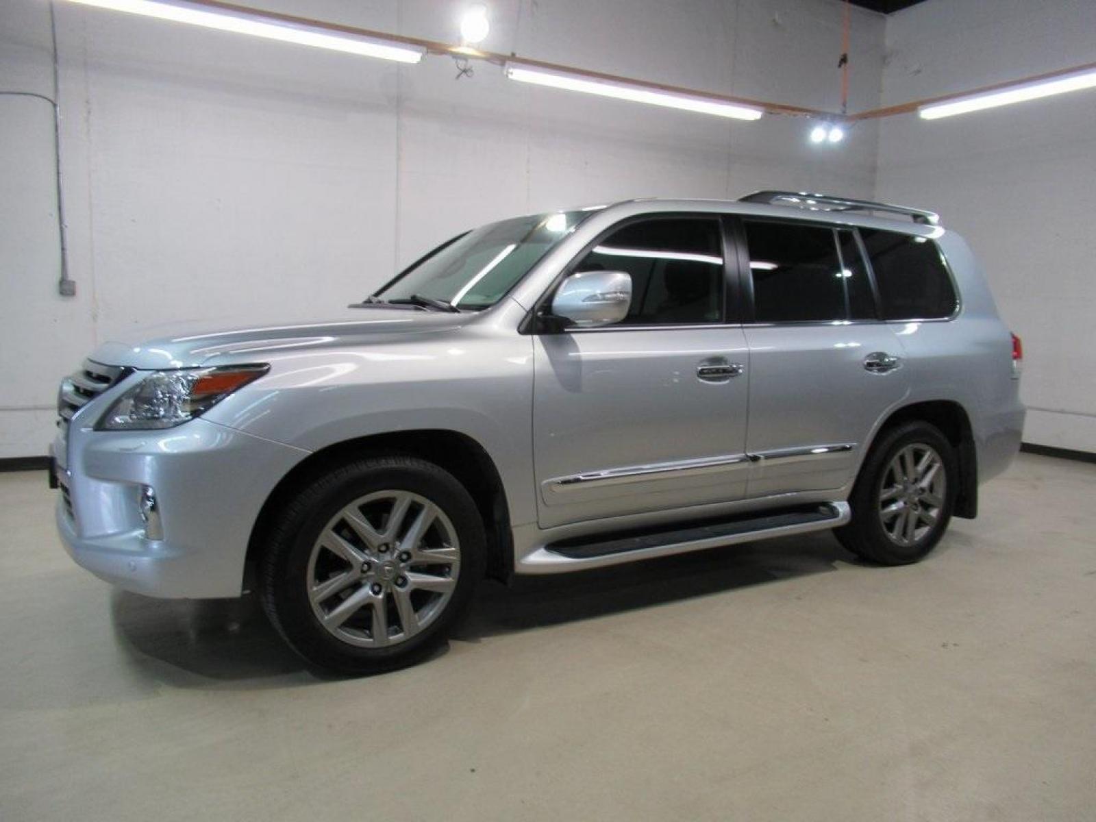 2014 Starfire Pearl /Black Lexus LX 570 (JTJHY7AXXE4) with an 5.7L V8 DOHC Dual VVT-i 32V engine, Automatic transmission, located at 15300 Midway Rd., Addison, 75001, (972) 702-0011, 32.958321, -96.838074 - HOME OF THE NO HAGGLE PRICE - WHOLESALE PRICES TO THE PUBLIC!! LX 570, 4D Sport Utility, 5.7L V8 DOHC Dual VVT-i 32V, 6-Speed Automatic with Sequential Shift ECT, 4WD, Black Leather.<br><br>2014 Lexus LX 570<br><br>Recent Arrival!<br><br>Awards:<br> * 2014 KBB.com Best Resale Value Awards * 2014 - Photo #4