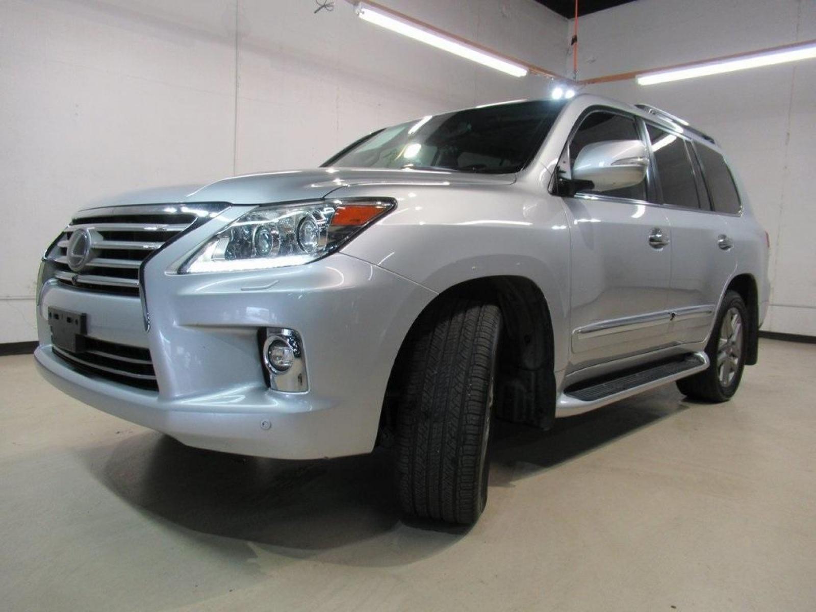 2014 Starfire Pearl /Black Lexus LX 570 (JTJHY7AXXE4) with an 5.7L V8 DOHC Dual VVT-i 32V engine, Automatic transmission, located at 15300 Midway Rd., Addison, 75001, (972) 702-0011, 32.958321, -96.838074 - HOME OF THE NO HAGGLE PRICE - WHOLESALE PRICES TO THE PUBLIC!! LX 570, 4D Sport Utility, 5.7L V8 DOHC Dual VVT-i 32V, 6-Speed Automatic with Sequential Shift ECT, 4WD, Black Leather.<br><br>2014 Lexus LX 570<br><br>Recent Arrival!<br><br>Awards:<br> * 2014 KBB.com Best Resale Value Awards * 2014 - Photo #8