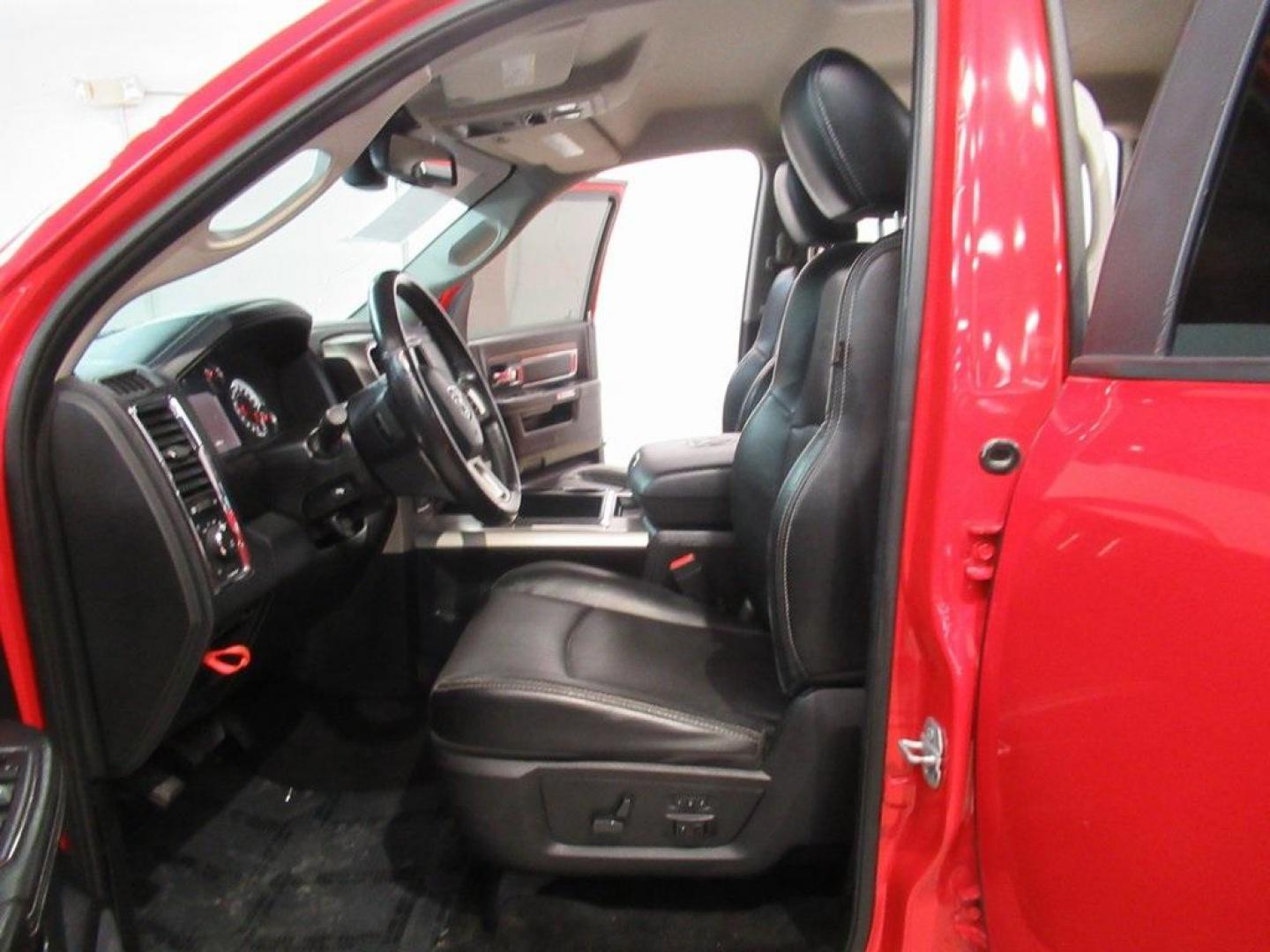 2015 Flame Red Clearcoat /Black Ram 1500 Laramie (1C6RR7NT5FS) with an HEMI 5.7L V8 Multi Displacement VVT engine, Automatic transmission, located at 15300 Midway Rd., Addison, TX, 75001, (972) 702-0011, 32.958321, -96.838074 - HOME OF THE NO HAGGLE PRICE - WHOLESALE PRICES TO THE PUBLIC!! 1500 Laramie, 4D Crew Cab, HEMI 5.7L V8 Multi Displacement VVT, 8-Speed Automatic, 4WD, Flame Red Clearcoat, Black Leather.<br><br>Flame Red Clearcoat 2015 Ram 1500 Laramie<br><br>Recent Arrival!<br><br>Awards:<br> * Green Car Journal 2 - Photo#12