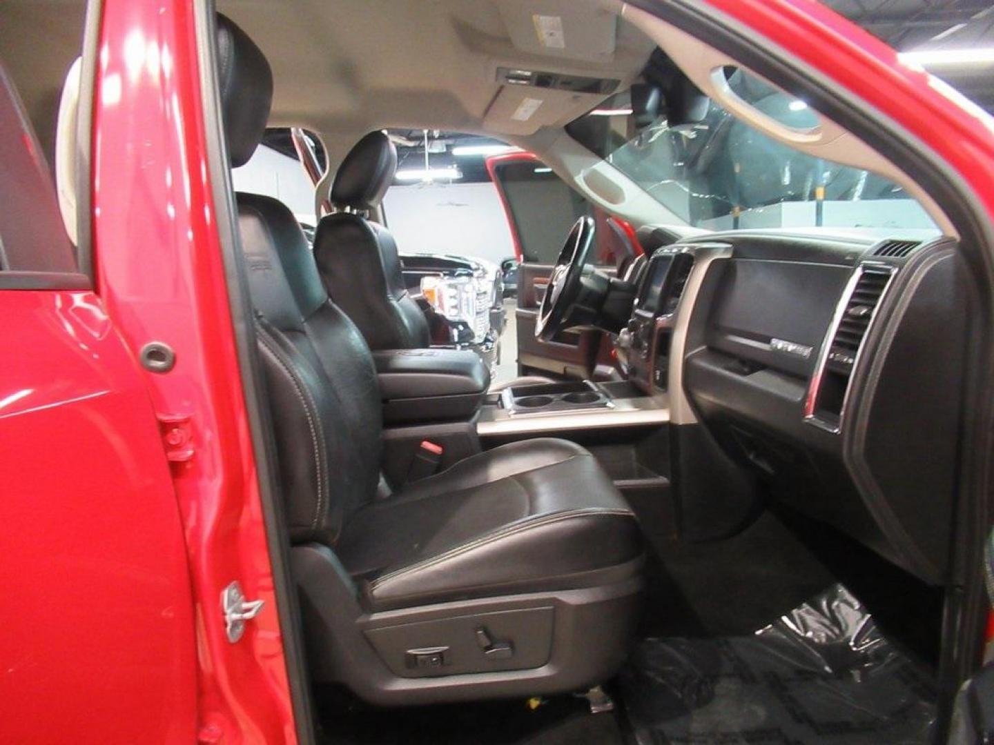 2015 Flame Red Clearcoat /Black Ram 1500 Laramie (1C6RR7NT5FS) with an HEMI 5.7L V8 Multi Displacement VVT engine, Automatic transmission, located at 15300 Midway Rd., Addison, TX, 75001, (972) 702-0011, 32.958321, -96.838074 - HOME OF THE NO HAGGLE PRICE - WHOLESALE PRICES TO THE PUBLIC!! 1500 Laramie, 4D Crew Cab, HEMI 5.7L V8 Multi Displacement VVT, 8-Speed Automatic, 4WD, Flame Red Clearcoat, Black Leather.<br><br>Flame Red Clearcoat 2015 Ram 1500 Laramie<br><br>Recent Arrival!<br><br>Awards:<br> * Green Car Journal 2 - Photo#13