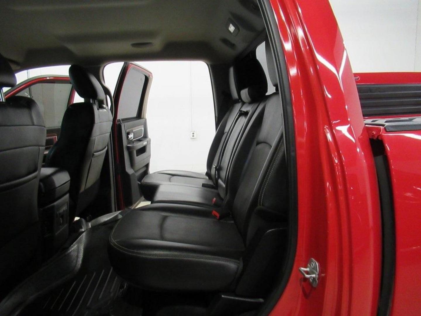 2015 Flame Red Clearcoat /Black Ram 1500 Laramie (1C6RR7NT5FS) with an HEMI 5.7L V8 Multi Displacement VVT engine, Automatic transmission, located at 15300 Midway Rd., Addison, TX, 75001, (972) 702-0011, 32.958321, -96.838074 - HOME OF THE NO HAGGLE PRICE - WHOLESALE PRICES TO THE PUBLIC!! 1500 Laramie, 4D Crew Cab, HEMI 5.7L V8 Multi Displacement VVT, 8-Speed Automatic, 4WD, Flame Red Clearcoat, Black Leather.<br><br>Flame Red Clearcoat 2015 Ram 1500 Laramie<br><br>Recent Arrival!<br><br>Awards:<br> * Green Car Journal 2 - Photo#15