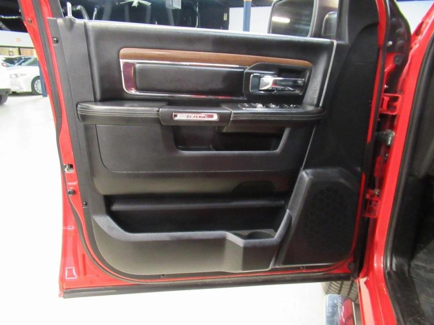 2015 Flame Red Clearcoat /Black Ram 1500 Laramie (1C6RR7NT5FS) with an HEMI 5.7L V8 Multi Displacement VVT engine, Automatic transmission, located at 15300 Midway Rd., Addison, TX, 75001, (972) 702-0011, 32.958321, -96.838074 - HOME OF THE NO HAGGLE PRICE - WHOLESALE PRICES TO THE PUBLIC!! 1500 Laramie, 4D Crew Cab, HEMI 5.7L V8 Multi Displacement VVT, 8-Speed Automatic, 4WD, Flame Red Clearcoat, Black Leather.<br><br>Flame Red Clearcoat 2015 Ram 1500 Laramie<br><br>Recent Arrival!<br><br>Awards:<br> * Green Car Journal 2 - Photo#33