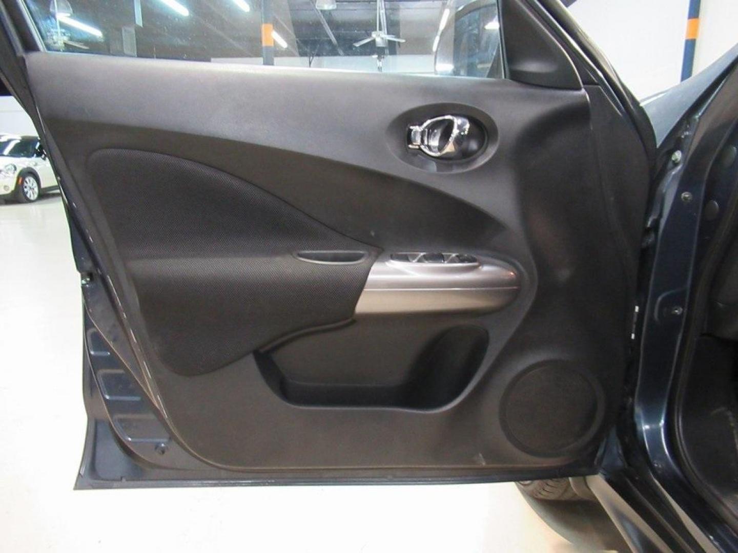 2013 Graphite Blue /Black Nissan Juke S (JN8AF5MV7DT) with an 1.6L I4 DOHC 16V engine, CVT transmission, located at 15300 Midway Rd., Addison, TX, 75001, (972) 702-0011, 32.958321, -96.838074 - Photo#22