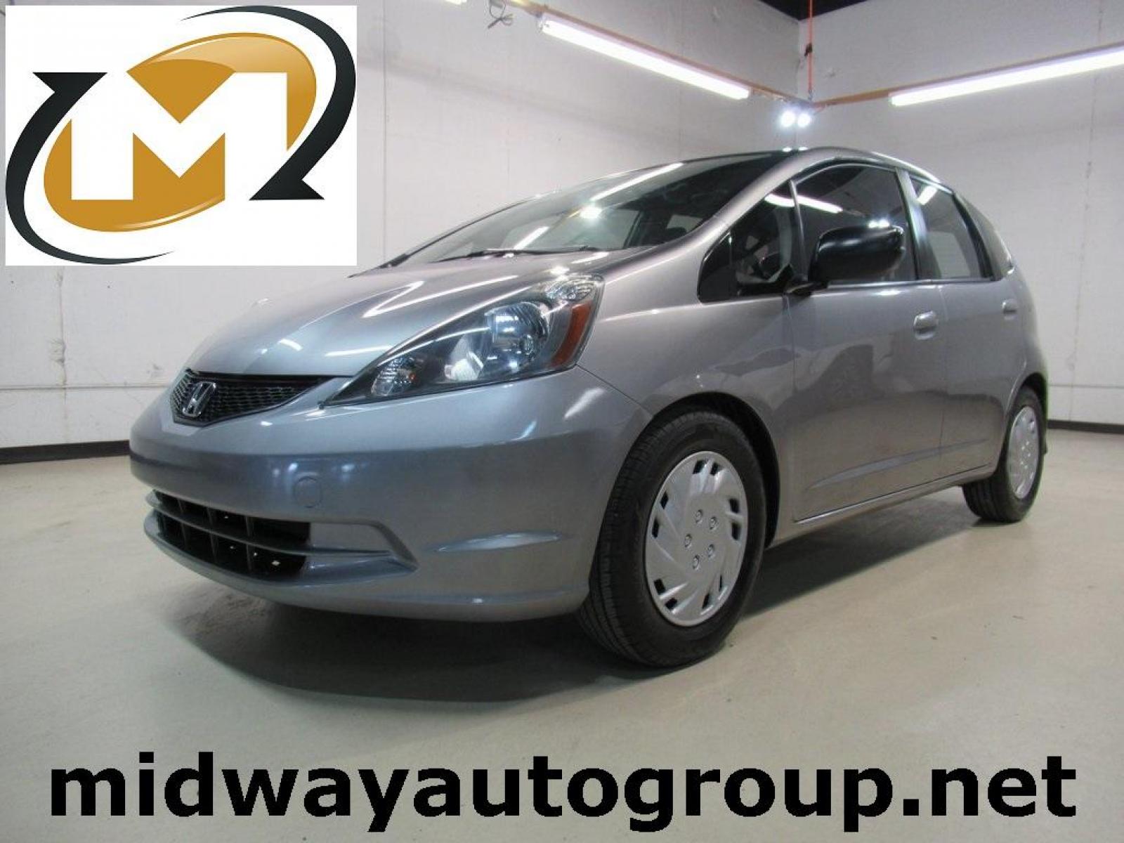 2010 Gray /Gray Honda Fit Base (JHMGE8H20AS) with an 1.5L 16V 4-Cylinder SOHC i-VTEC engine, Automatic transmission, located at 15300 Midway Rd., Addison, 75001, (972) 702-0011, 32.958321, -96.838074 - Photo #0
