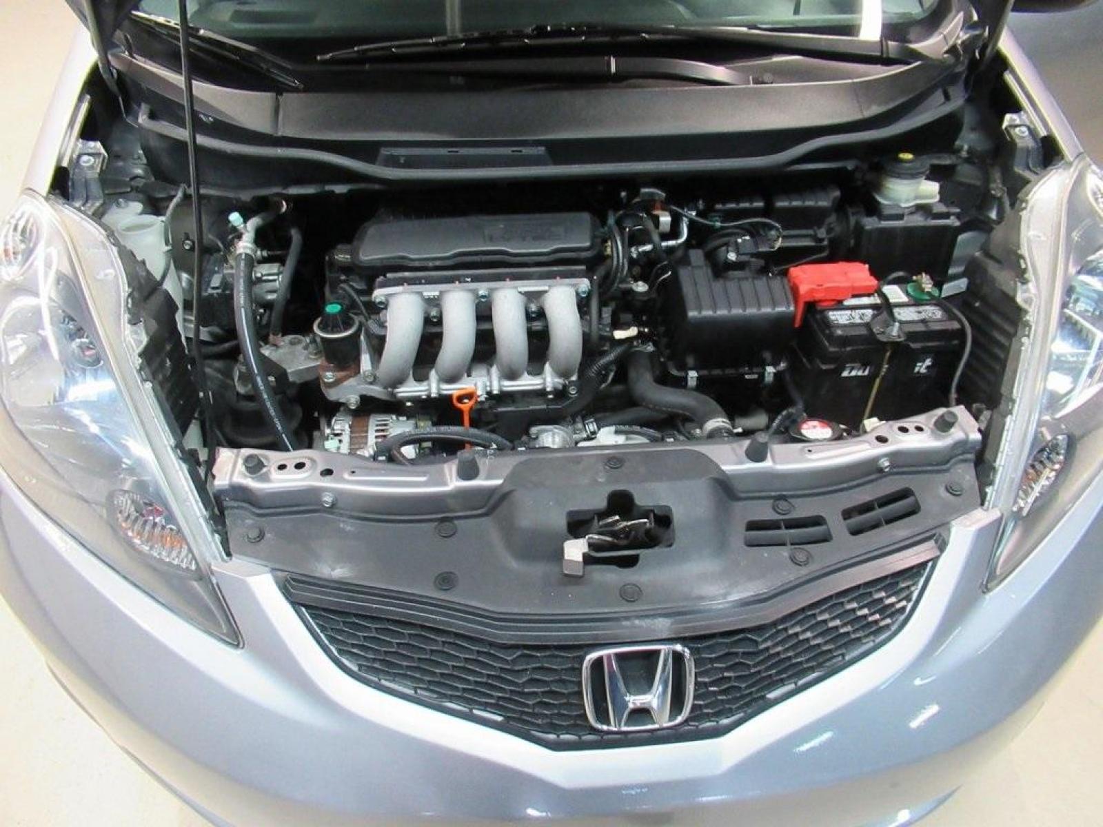 2010 Gray /Gray Honda Fit Base (JHMGE8H20AS) with an 1.5L 16V 4-Cylinder SOHC i-VTEC engine, Automatic transmission, located at 15300 Midway Rd., Addison, 75001, (972) 702-0011, 32.958321, -96.838074 - Photo #25