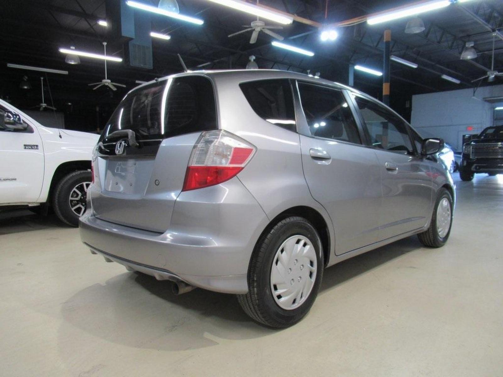 2010 Gray /Gray Honda Fit Base (JHMGE8H20AS) with an 1.5L 16V 4-Cylinder SOHC i-VTEC engine, Automatic transmission, located at 15300 Midway Rd., Addison, 75001, (972) 702-0011, 32.958321, -96.838074 - Photo #2