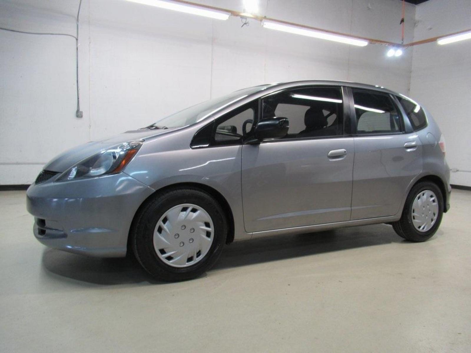 2010 Gray /Gray Honda Fit Base (JHMGE8H20AS) with an 1.5L 16V 4-Cylinder SOHC i-VTEC engine, Automatic transmission, located at 15300 Midway Rd., Addison, 75001, (972) 702-0011, 32.958321, -96.838074 - Photo #4