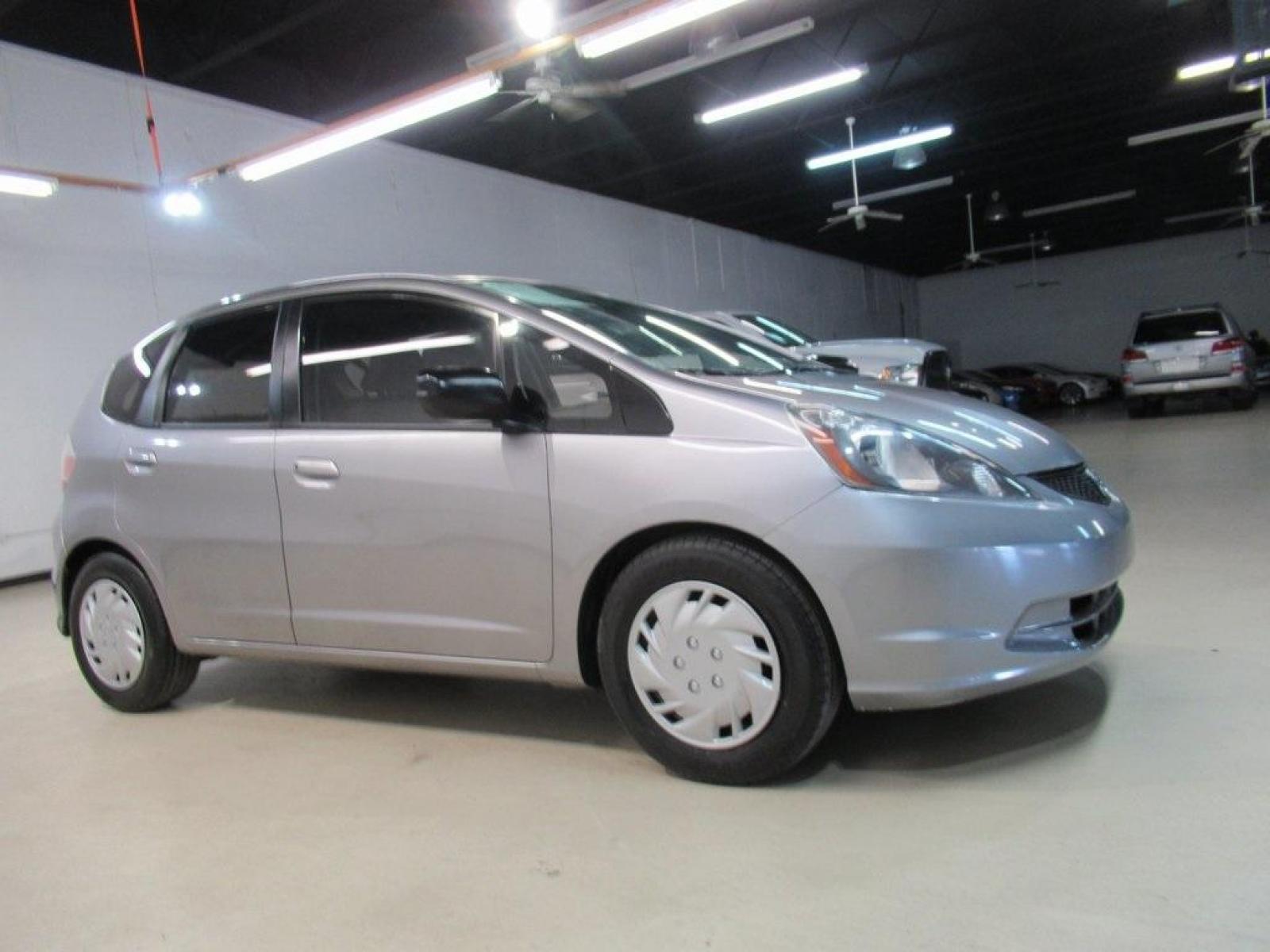 2010 Gray /Gray Honda Fit Base (JHMGE8H20AS) with an 1.5L 16V 4-Cylinder SOHC i-VTEC engine, Automatic transmission, located at 15300 Midway Rd., Addison, 75001, (972) 702-0011, 32.958321, -96.838074 - Photo #6