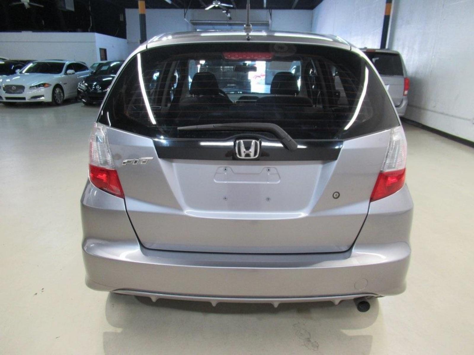 2010 Gray /Gray Honda Fit Base (JHMGE8H20AS) with an 1.5L 16V 4-Cylinder SOHC i-VTEC engine, Automatic transmission, located at 15300 Midway Rd., Addison, 75001, (972) 702-0011, 32.958321, -96.838074 - Photo #7