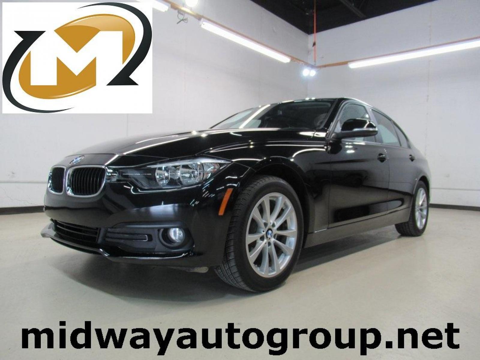 2017 Jet Black /Black BMW 3 Series 320i (WBA8E1G31HN) with an 2.0L 4-Cylinder DOHC 16V TwinPower Turbo engine, Automatic transmission, located at 15300 Midway Rd., Addison, 75001, (972) 702-0011, 32.958321, -96.838074 - HOME OF THE NO HAGGLE PRICE - WHOLESALE PRICES TO THE PUBLIC!! 320i, 4D Sedan, 2.0L 4-Cylinder DOHC 16V TwinPower Turbo, 8-Speed Automatic, RWD, Jet Black, Black Artificial Leather. Odometer is 37381 miles below market average!<br><br>Jet Black 2017 BMW 3 Series 320i<br><br>23/35 City/Highway MPG<br - Photo #0