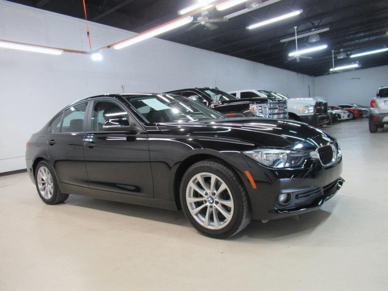 2017 Jet Black /Black BMW 3 Series 320i (WBA8E1G31HN) with an 2.0L 4-Cylinder DOHC 16V TwinPower Turbo engine, Automatic transmission, located at 15300 Midway Rd., Addison, 75001, (972) 702-0011, 32.958321, -96.838074 - HOME OF THE NO HAGGLE PRICE - WHOLESALE PRICES TO THE PUBLIC!! 320i, 4D Sedan, 2.0L 4-Cylinder DOHC 16V TwinPower Turbo, 8-Speed Automatic, RWD, Jet Black, Black Artificial Leather. Odometer is 37381 miles below market average!<br><br>Jet Black 2017 BMW 3 Series 320i<br><br>23/35 City/Highway MPG<br - Photo #6