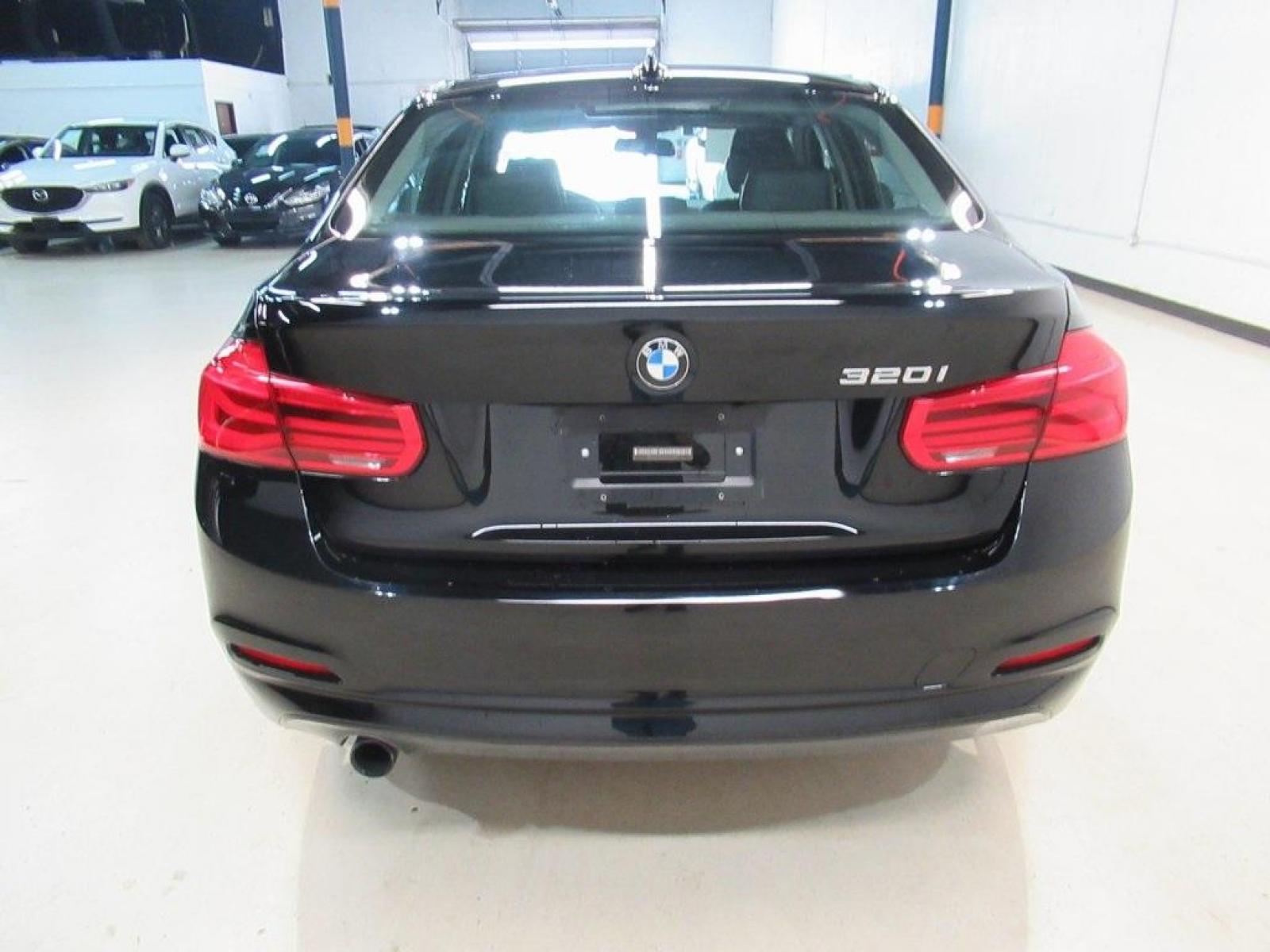 2017 Jet Black /Black BMW 3 Series 320i (WBA8E1G31HN) with an 2.0L 4-Cylinder DOHC 16V TwinPower Turbo engine, Automatic transmission, located at 15300 Midway Rd., Addison, 75001, (972) 702-0011, 32.958321, -96.838074 - HOME OF THE NO HAGGLE PRICE - WHOLESALE PRICES TO THE PUBLIC!! 320i, 4D Sedan, 2.0L 4-Cylinder DOHC 16V TwinPower Turbo, 8-Speed Automatic, RWD, Jet Black, Black Artificial Leather. Odometer is 37381 miles below market average!<br><br>Jet Black 2017 BMW 3 Series 320i<br><br>23/35 City/Highway MPG<br - Photo #7