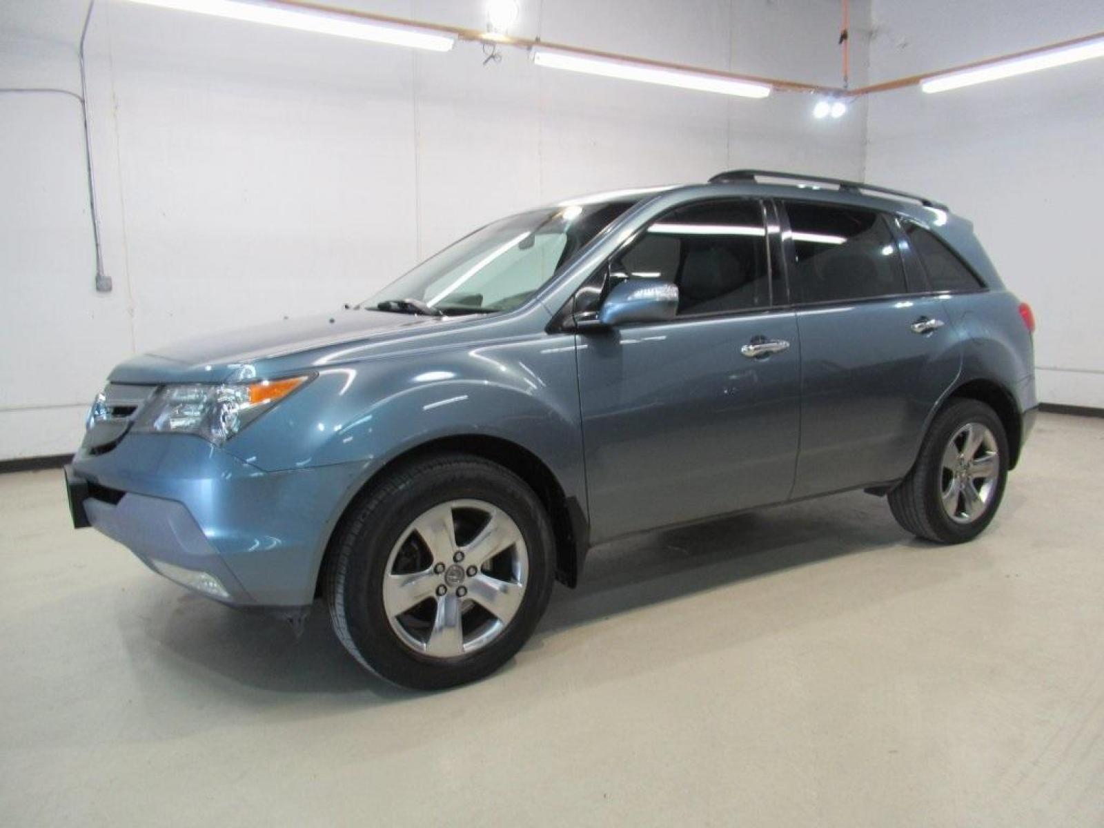 2007 Steel Blue Metallic /Ebony Acura MDX 3.7L (2HNYD28537H) with an V6 engine, Automatic transmission, located at 15300 Midway Rd., Addison, 75001, (972) 702-0011, 32.958321, -96.838074 - HOME OF THE NO HAGGLE PRICE - WHOLESALE PRICES TO THE PUBLIC!! MDX 3.7L SH-AWD, 4D Sport Utility, V6, 5-Speed Automatic, AWD, Blue, Ebony Leather.<br><br>Blue 2007 Acura MDX 3.7L<br><br><br>Awards:<br> * 2007 KBB.com Best Resale Value Awards<br>For more information, visit www.kbb.com. Kelley Blue B - Photo #4