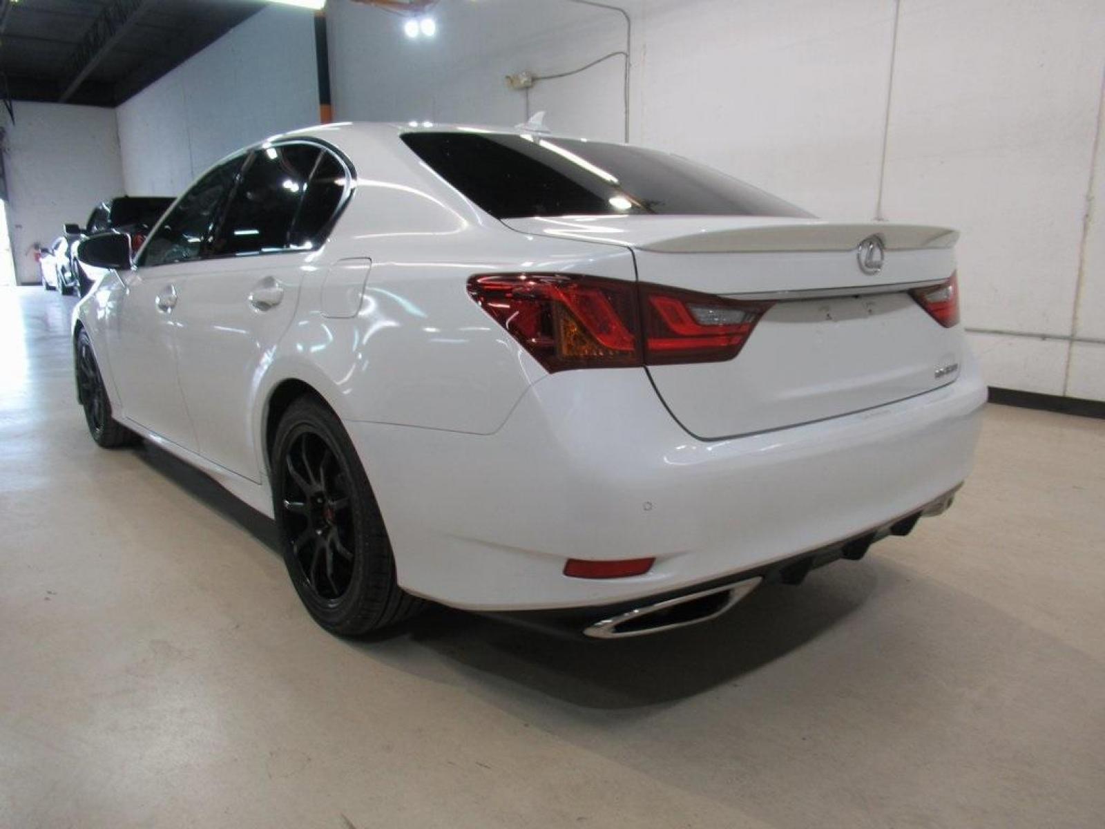 2014 White /Black Lexus GS 350 (JTHBE1BL0E5) with an 3.5L V6 DOHC 24V engine, Automatic transmission, located at 15300 Midway Rd., Addison, 75001, (972) 702-0011, 32.958321, -96.838074 - HOME OF THE NO HAGGLE PRICE - WHOLESALE PRICES TO THE PUBLIC!! GS 350, 4D Sedan, 3.5L V6 DOHC 24V, 8-Speed Automatic with Sequential Shift, RWD, White, Black Leather.<br><br>White 2014 Lexus GS 350<br><br>19/29 City/Highway MPG<br><br>Awards:<br> * JD Power Vehicle Dependability Study (VDS) * JD - Photo #3