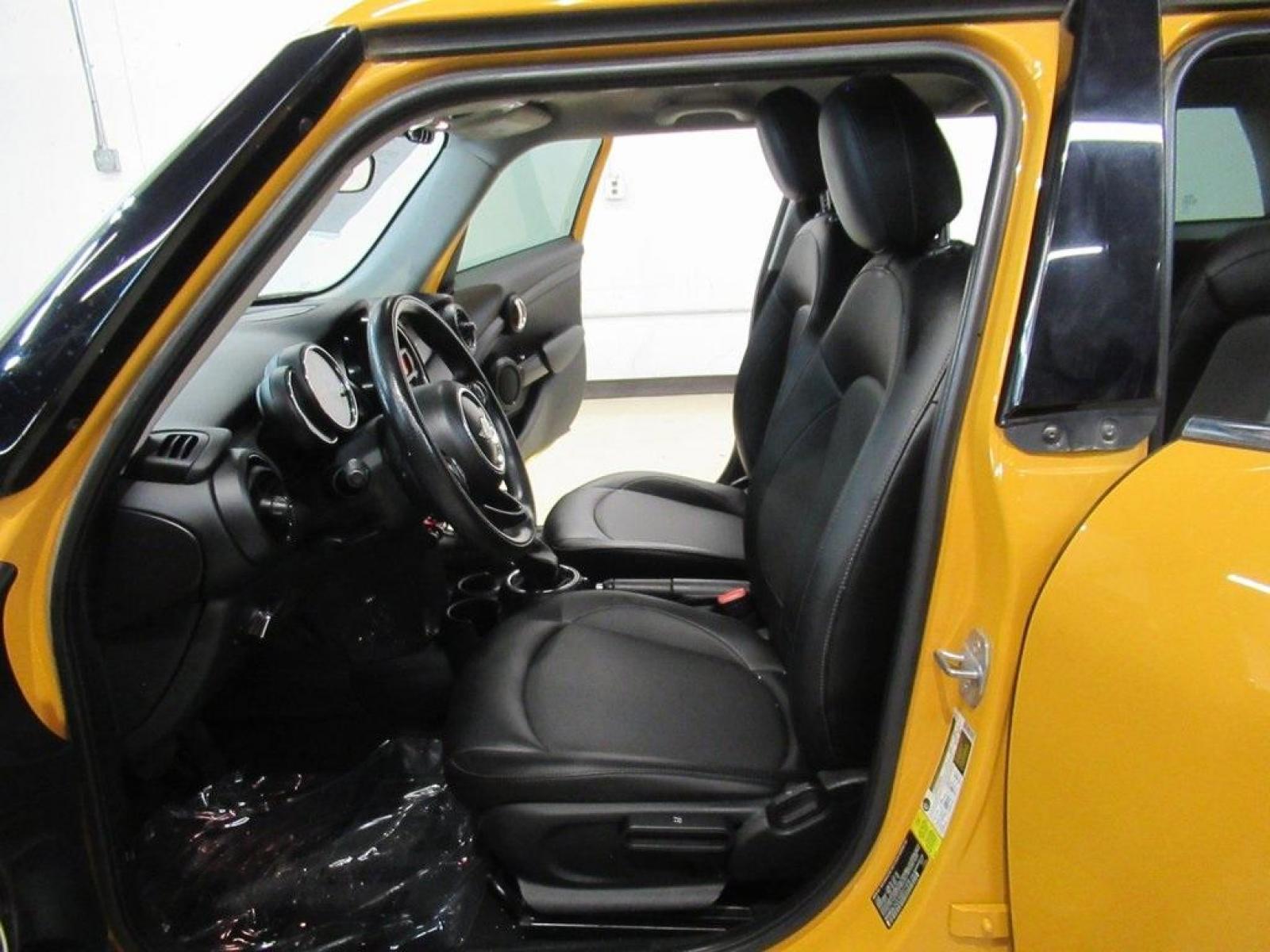 2016 Volcanic Orange /Carbon Black MINI Cooper Base (WMWXU1C51G2) with an 1.5L 12V TwinPower Turbo engine, Automatic transmission, located at 15300 Midway Rd., Addison, 75001, (972) 702-0011, 32.958321, -96.838074 - HOME OF THE NO HAGGLE PRICE - WHOLESALE PRICES TO THE PUBLIC!! 4D Hatchback, 1.5L 12V TwinPower Turbo, 6-Speed Automatic, FWD, Volcanic Orange, Carbon Black Artificial Leather. Odometer is 9768 miles below market average!<br><br>Volcanic Orange 2016 MINI Cooper<br><br>Recent Arrival! 27/37 City/High - Photo #14