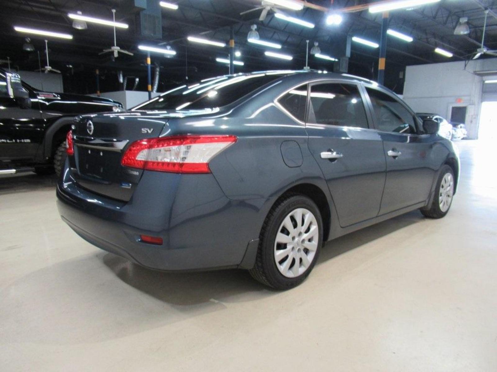 2014 Graphite Blue /Charcoal Nissan Sentra SV (3N1AB7AP7EY) with an 1.8L 4-Cylinder DOHC 16V engine, CVT transmission, located at 15300 Midway Rd., Addison, 75001, (972) 702-0011, 32.958321, -96.838074 - HOME OF THE NO HAGGLE PRICE - WHOLESALE PRICES TO THE PUBLIC!! Sentra SV, 4D Sedan, 1.8L 4-Cylinder DOHC 16V, CVT with Xtronic, FWD, Graphite Blue, Charcoal Cloth. Odometer is 64340 miles below market average!<br><br>Graphite Blue 2014 Nissan Sentra SV<br><br>30/39 City/Highway MPG<br><br>Awards:<br - Photo #2