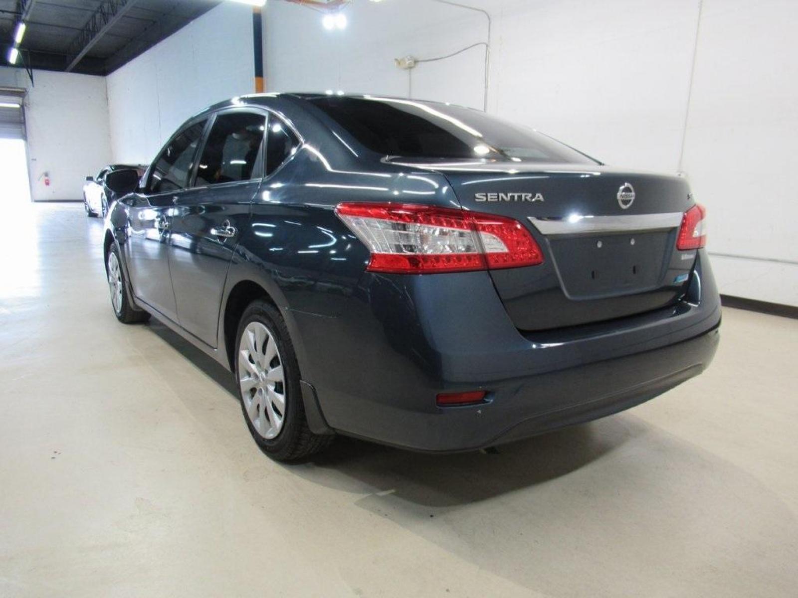 2014 Graphite Blue /Charcoal Nissan Sentra SV (3N1AB7AP7EY) with an 1.8L 4-Cylinder DOHC 16V engine, CVT transmission, located at 15300 Midway Rd., Addison, 75001, (972) 702-0011, 32.958321, -96.838074 - HOME OF THE NO HAGGLE PRICE - WHOLESALE PRICES TO THE PUBLIC!! Sentra SV, 4D Sedan, 1.8L 4-Cylinder DOHC 16V, CVT with Xtronic, FWD, Graphite Blue, Charcoal Cloth. Odometer is 64340 miles below market average!<br><br>Graphite Blue 2014 Nissan Sentra SV<br><br>30/39 City/Highway MPG<br><br>Awards:<br - Photo #3