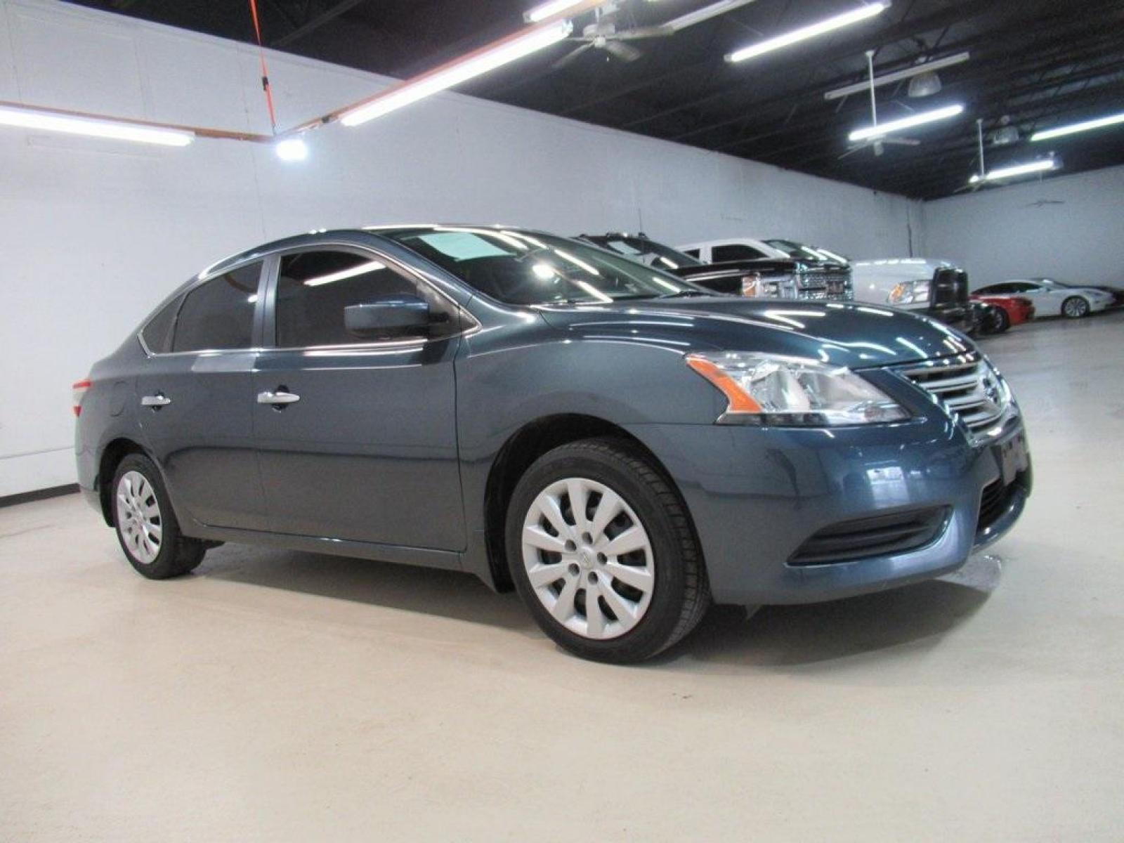 2014 Graphite Blue /Charcoal Nissan Sentra SV (3N1AB7AP7EY) with an 1.8L 4-Cylinder DOHC 16V engine, CVT transmission, located at 15300 Midway Rd., Addison, 75001, (972) 702-0011, 32.958321, -96.838074 - HOME OF THE NO HAGGLE PRICE - WHOLESALE PRICES TO THE PUBLIC!! Sentra SV, 4D Sedan, 1.8L 4-Cylinder DOHC 16V, CVT with Xtronic, FWD, Graphite Blue, Charcoal Cloth. Odometer is 64340 miles below market average!<br><br>Graphite Blue 2014 Nissan Sentra SV<br><br>30/39 City/Highway MPG<br><br>Awards:<br - Photo #6