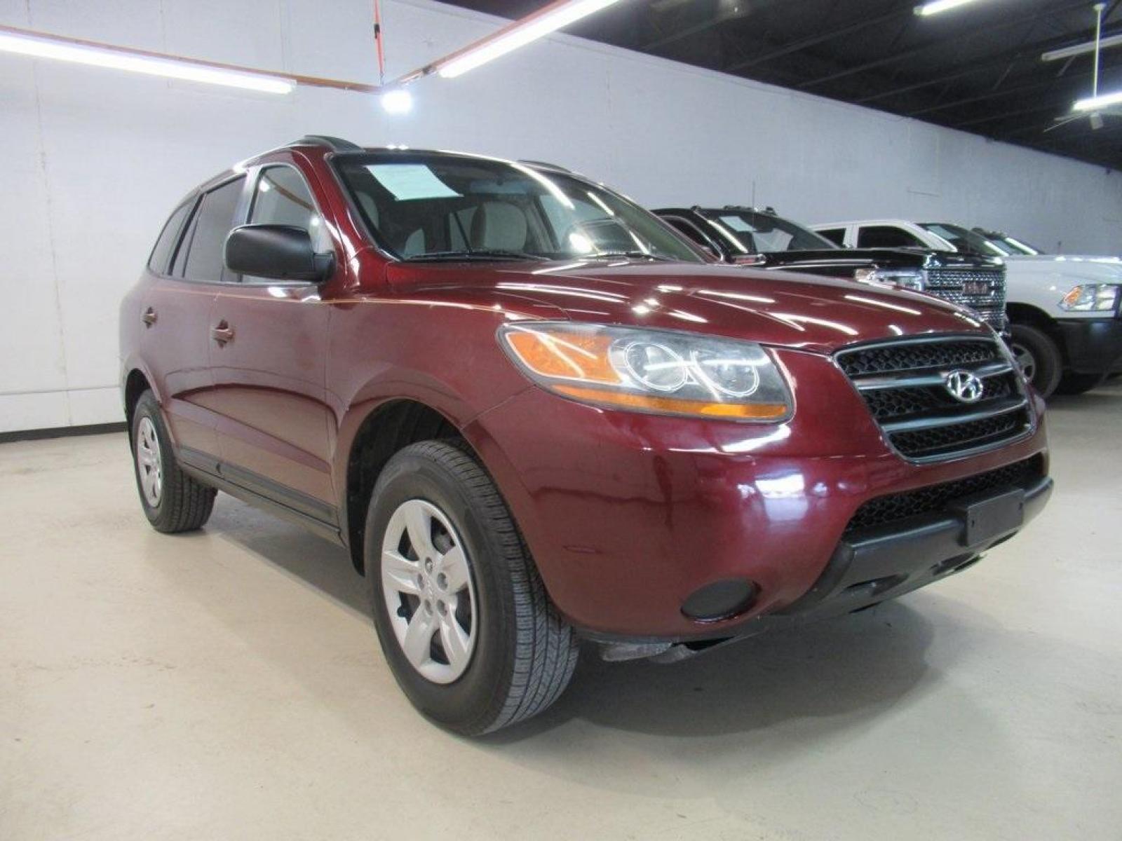 2009 Dark Cherry Red Mica /Beige Hyundai Santa Fe GLS (5NMSG13D69H) with an 2.7L V6 MPI DOHC 24V ULEV II 185hp engine, Automatic transmission, located at 15300 Midway Rd., Addison, 75001, (972) 702-0011, 32.958321, -96.838074 - Photo #1