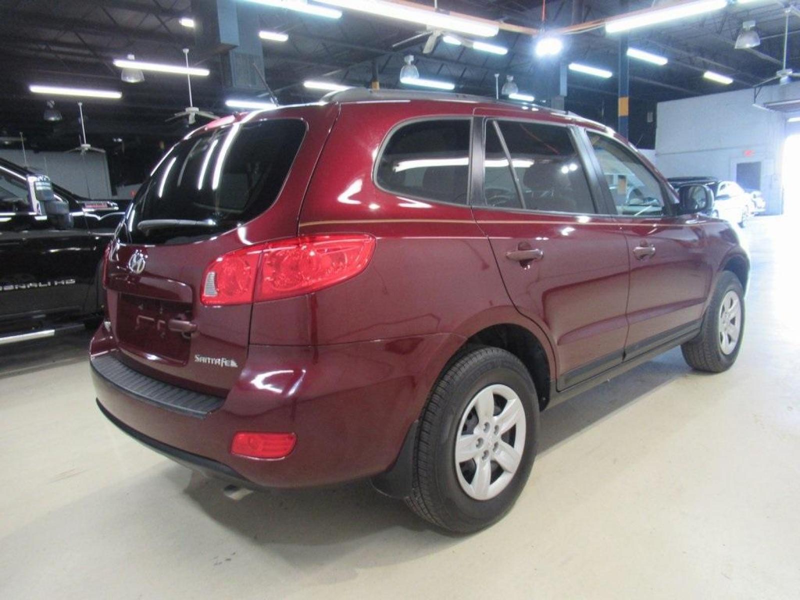 2009 Dark Cherry Red Mica /Beige Hyundai Santa Fe GLS (5NMSG13D69H) with an 2.7L V6 MPI DOHC 24V ULEV II 185hp engine, Automatic transmission, located at 15300 Midway Rd., Addison, 75001, (972) 702-0011, 32.958321, -96.838074 - Photo #2