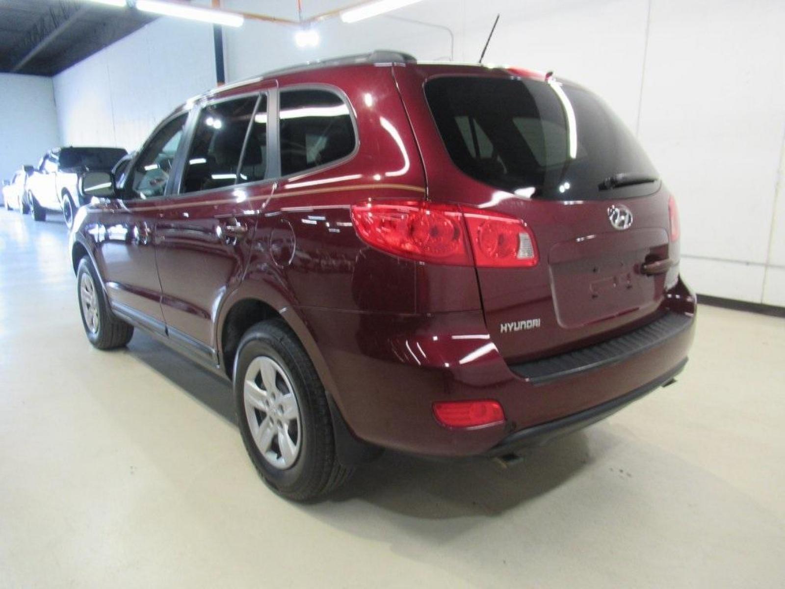 2009 Dark Cherry Red Mica /Beige Hyundai Santa Fe GLS (5NMSG13D69H) with an 2.7L V6 MPI DOHC 24V ULEV II 185hp engine, Automatic transmission, located at 15300 Midway Rd., Addison, 75001, (972) 702-0011, 32.958321, -96.838074 - Photo #3