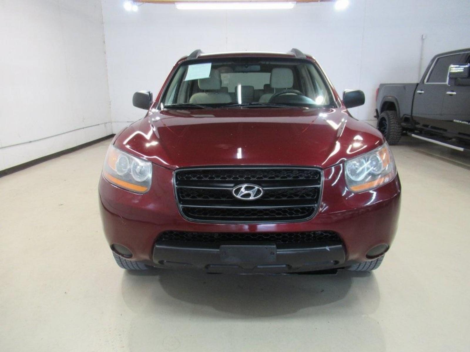 2009 Dark Cherry Red Mica /Beige Hyundai Santa Fe GLS (5NMSG13D69H) with an 2.7L V6 MPI DOHC 24V ULEV II 185hp engine, Automatic transmission, located at 15300 Midway Rd., Addison, 75001, (972) 702-0011, 32.958321, -96.838074 - Photo #5