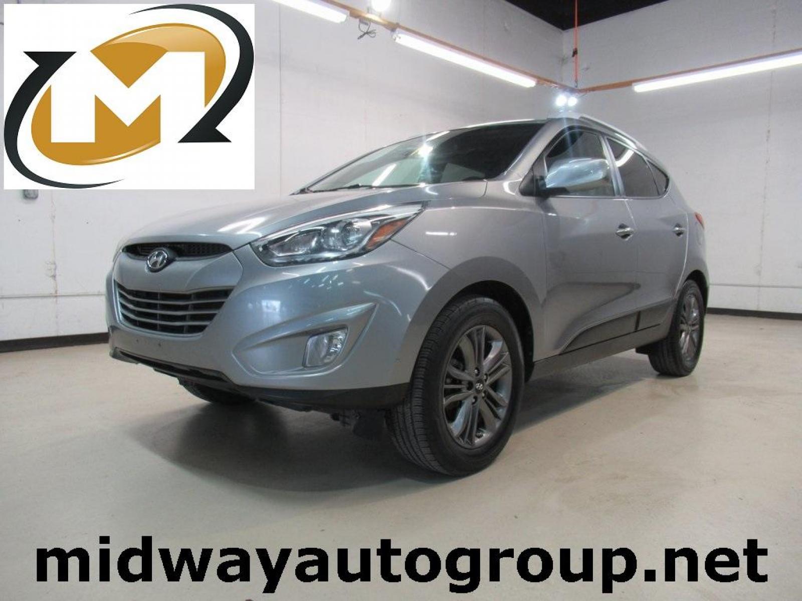 2015 Graphite Gray Metallic /Beige Two-Tone Hyundai Tucson SE (KM8JU3AG4FU) with an I4 engine, Automatic transmission, located at 15300 Midway Rd., Addison, 75001, (972) 702-0011, 32.958321, -96.838074 - Photo #0