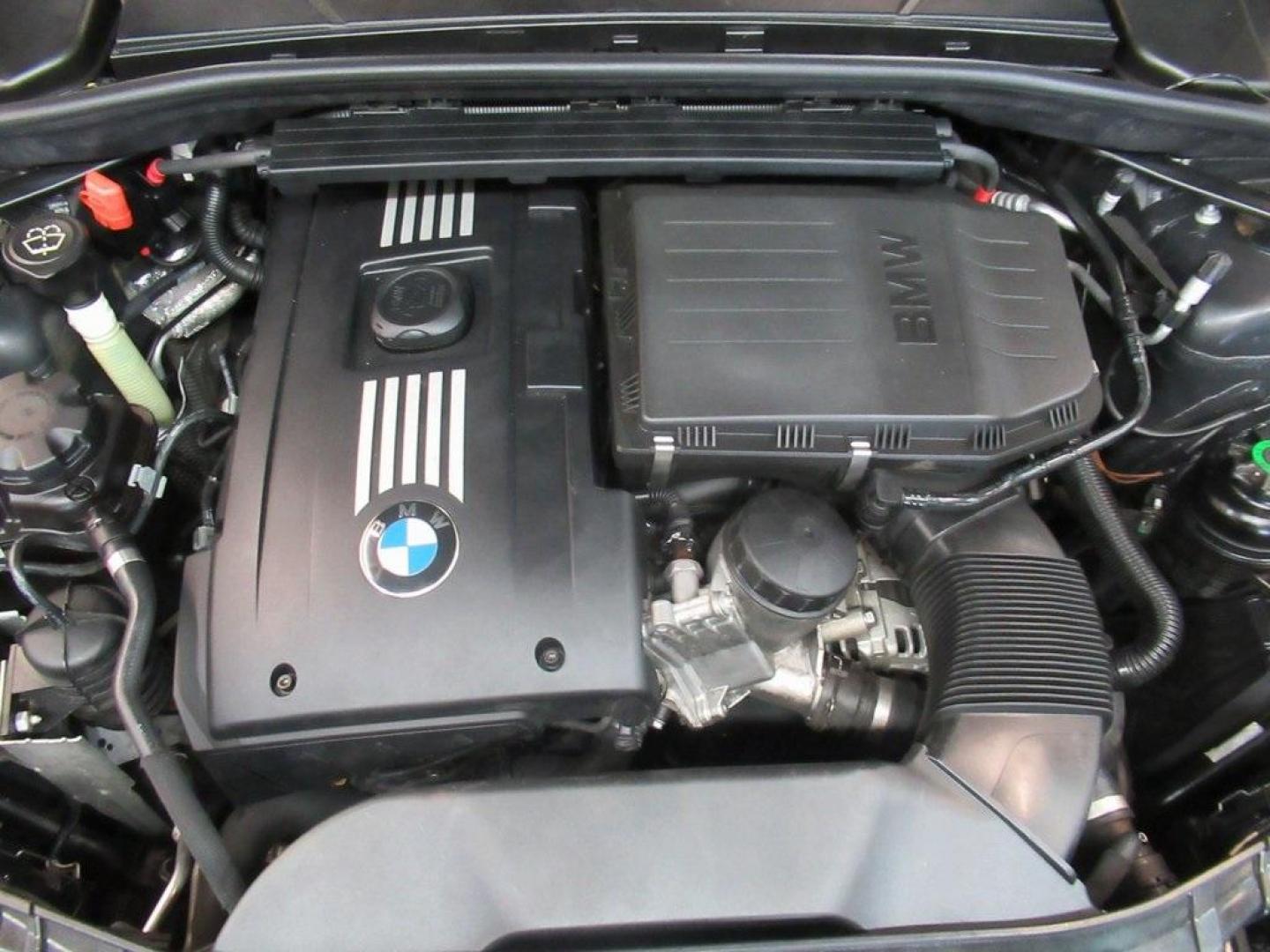 2008 Jet Black /Black Boston BMW 1 Series 135i (WBAUN93548V) with an 3.0L I6 DOHC 24V Twin Turbocharged engine, Automatic transmission, located at 15300 Midway Rd., Addison, TX, 75001, (972) 702-0011, 32.958321, -96.838074 - HOME OF THE NO HAGGLE PRICE - WHOLESALE PRICES TO THE PUBLIC!! 135i, 2D Convertible, 3.0L I6 DOHC 24V Twin Turbocharged, 6-Speed Automatic Steptronic, RWD, Jet Black, Black Boston Leather.<br><br>Jet Black 2008 BMW 1 Series 135i<br><br>17/26 City/Highway MPG<br><br>Awards:<br> * 2008 KBB.com Brand - Photo#32