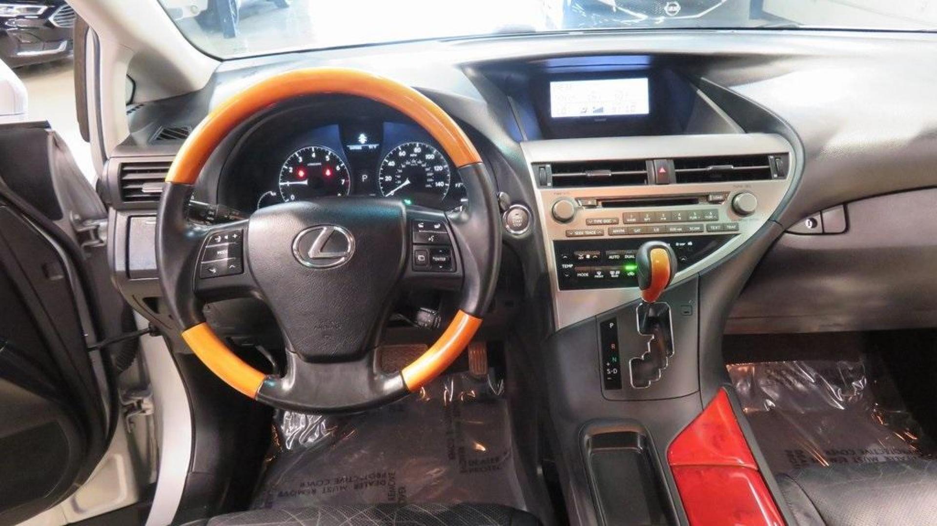 2011 Smoky Granite Mica /Parchment Lexus RX 350 (2T2ZK1BA7BC) with an 3.5L V6 DOHC Dual VVT-i 24V engine, Automatic transmission, located at 15300 Midway Rd., Addison, TX, 75001, (972) 702-0011, 32.958321, -96.838074 - HOME OF THE NO HAGGLE PRICE - WHOLESALE PRICES TO THE PUBLIC!! RX 350, 4D Sport Utility, 3.5L V6 DOHC Dual VVT-i 24V, 6-Speed Automatic with Sequential Shift ECT-i, FWD, Silver, Parchment w/Semi-Aniline Leather Seat Trim or Smooth Perforated Leather Seat Trim.<br><br>Silver 2011 Lexus RX 350<br><br> - Photo#18