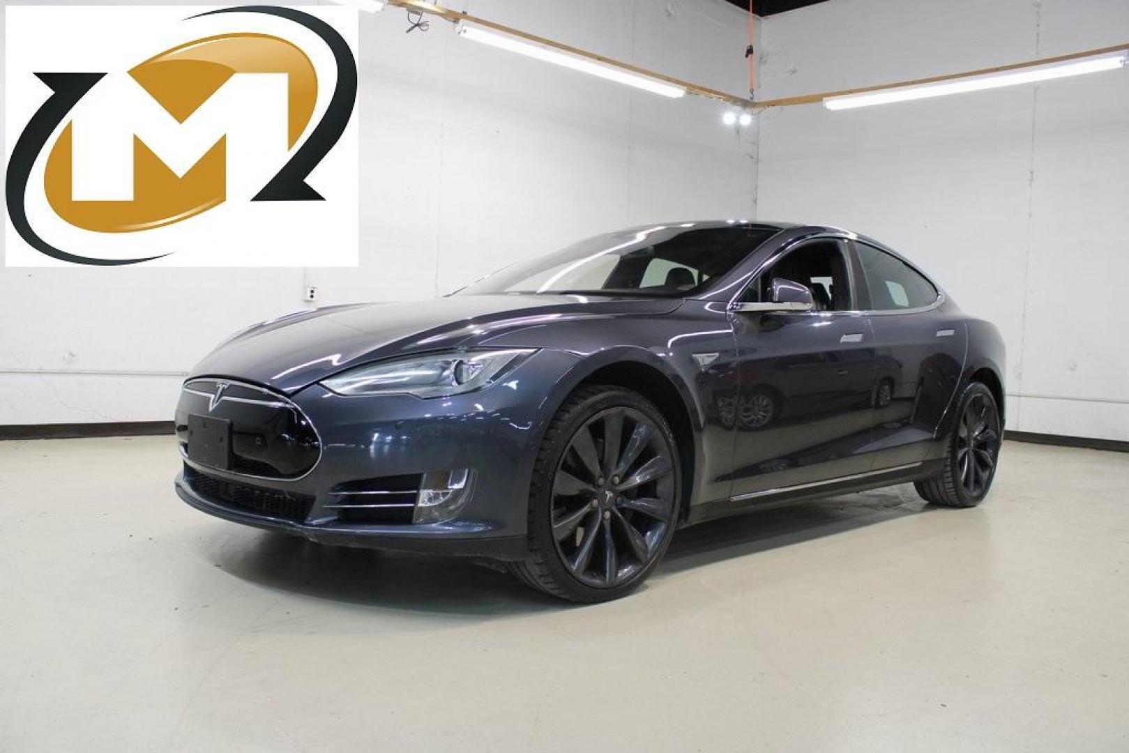2014 Gray Metallic /Black Tesla Model S P85D (5YJSA1H21EF) with an Electric Motor engine, Automatic transmission, located at 15300 Midway Rd., Addison, TX, 75001, (972) 702-0011, 32.958321, -96.838074 - HOME OF THE NO HAGGLE PRICE - WHOLESALE PRICES TO THE PUBLIC!! Model S P85D, 4D Hatchback, 12-Cylinder Electric ZEV 691hp, 1-Speed Automatic, AWD, Gray, Leather.<br><br>Gray 2014 Tesla Model S P85D<br><br>86/94 City/Highway MPG<br><br><br>At Midway Auto Group, we strive to provide you with the best - Photo#0