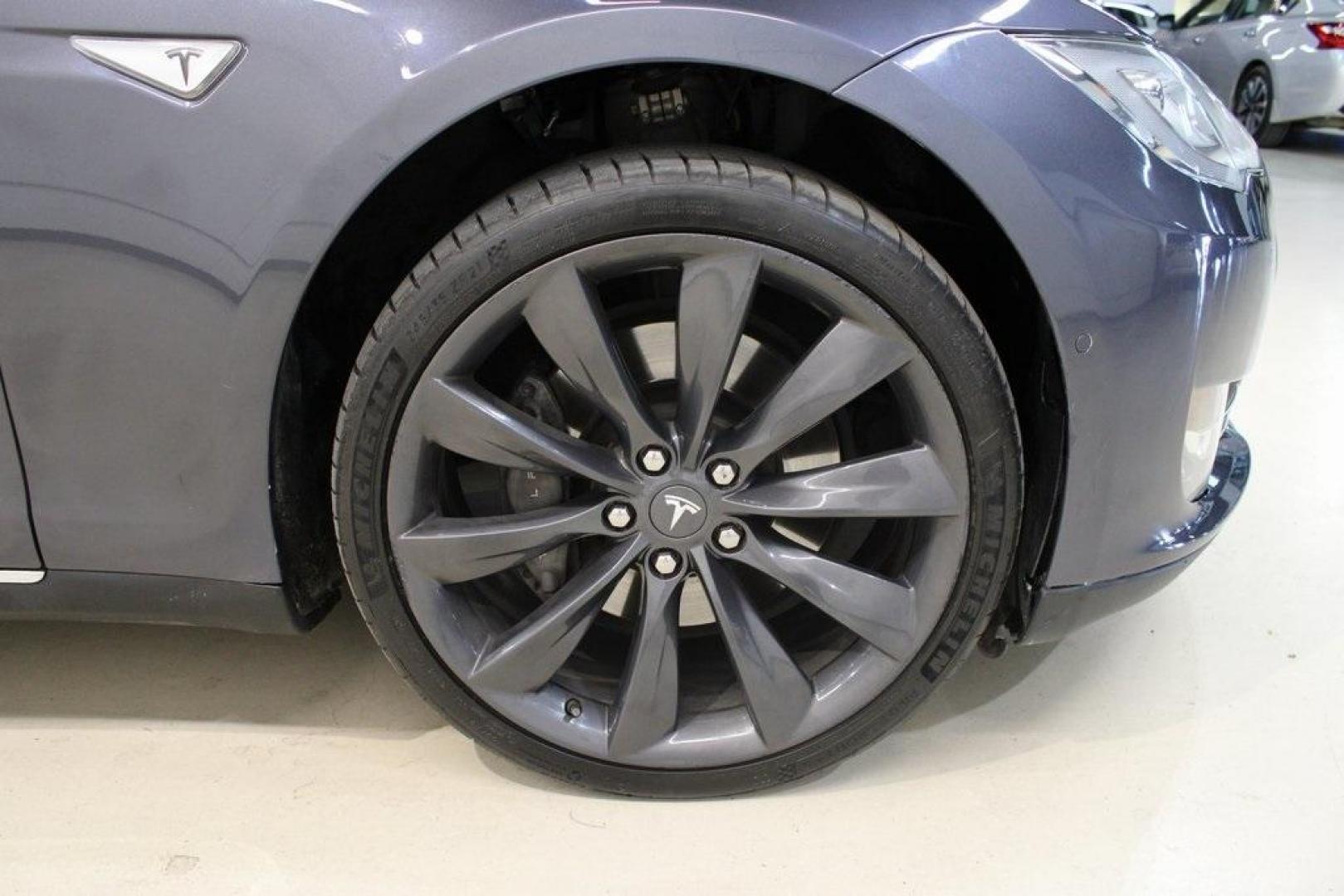 2014 Gray Metallic /Black Tesla Model S P85D (5YJSA1H21EF) with an Electric Motor engine, Automatic transmission, located at 15300 Midway Rd., Addison, TX, 75001, (972) 702-0011, 32.958321, -96.838074 - HOME OF THE NO HAGGLE PRICE - WHOLESALE PRICES TO THE PUBLIC!! Model S P85D, 4D Hatchback, 12-Cylinder Electric ZEV 691hp, 1-Speed Automatic, AWD, Gray, Leather.<br><br>Gray 2014 Tesla Model S P85D<br><br>86/94 City/Highway MPG<br><br><br>At Midway Auto Group, we strive to provide you with the best - Photo#9