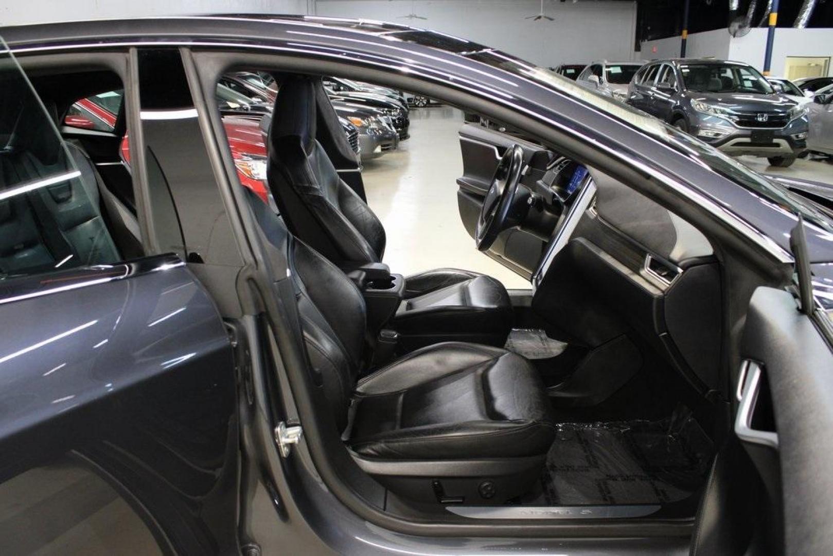 2014 Gray Metallic /Black Tesla Model S P85D (5YJSA1H21EF) with an Electric Motor engine, Automatic transmission, located at 15300 Midway Rd., Addison, TX, 75001, (972) 702-0011, 32.958321, -96.838074 - HOME OF THE NO HAGGLE PRICE - WHOLESALE PRICES TO THE PUBLIC!! Model S P85D, 4D Hatchback, 12-Cylinder Electric ZEV 691hp, 1-Speed Automatic, AWD, Gray, Leather.<br><br>Gray 2014 Tesla Model S P85D<br><br>86/94 City/Highway MPG<br><br><br>At Midway Auto Group, we strive to provide you with the best - Photo#12